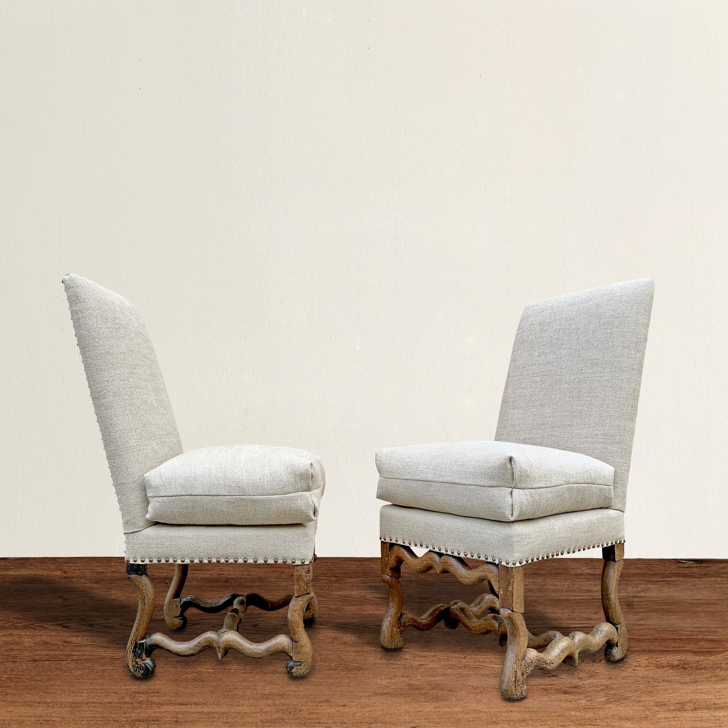 A rare pair of 17th century French Louis XIII os de mouton (sheep's bone) side chairs from the Château de Théobon. The Château de Théobon was originally built in the 12th century as a fortress in the Loubès-Bernac region of Southwestern France, and