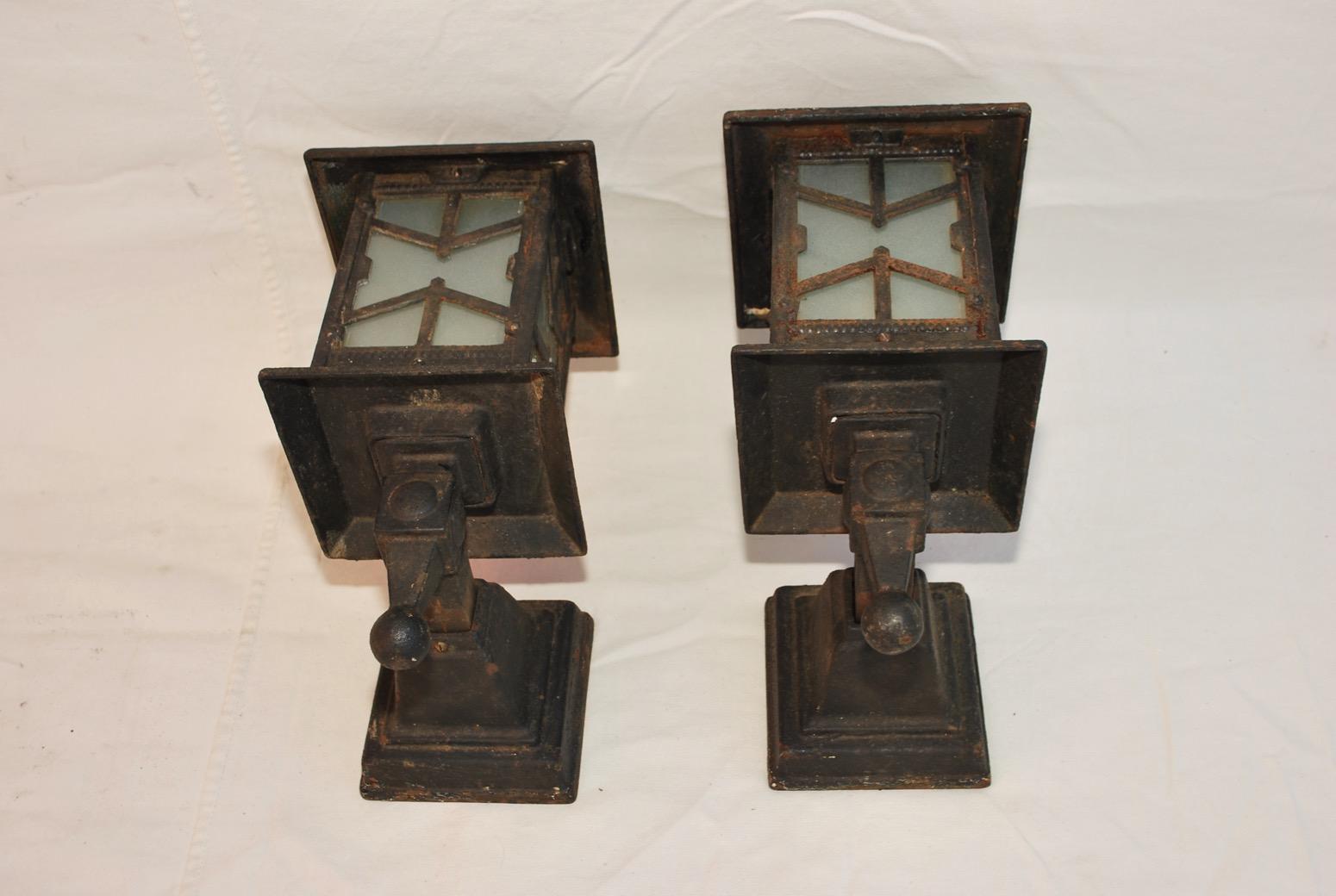 American Rare Pair of 1920s Cast Iron Outdoor Sconces