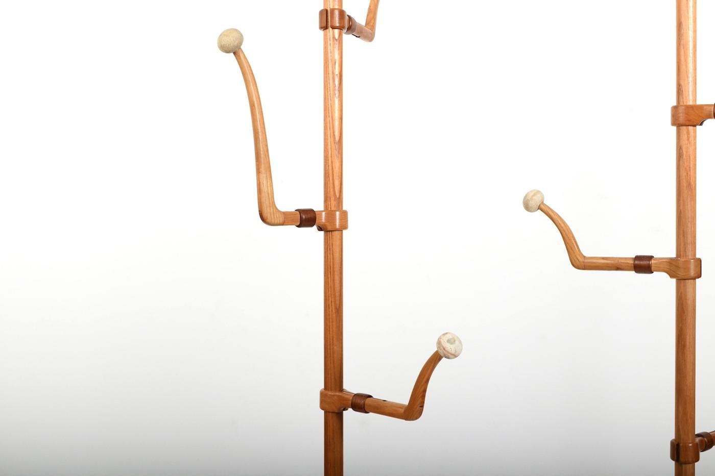 Very rare and large (250cm) 1950s danish pair of sculptural coathanger / hatstands by Harbo Sølvsten. Made in solid elm and rings in mahogany wood.Adjustable hangers. By shortening the rods, you can fit them individually at home Denmark 1950s. H.