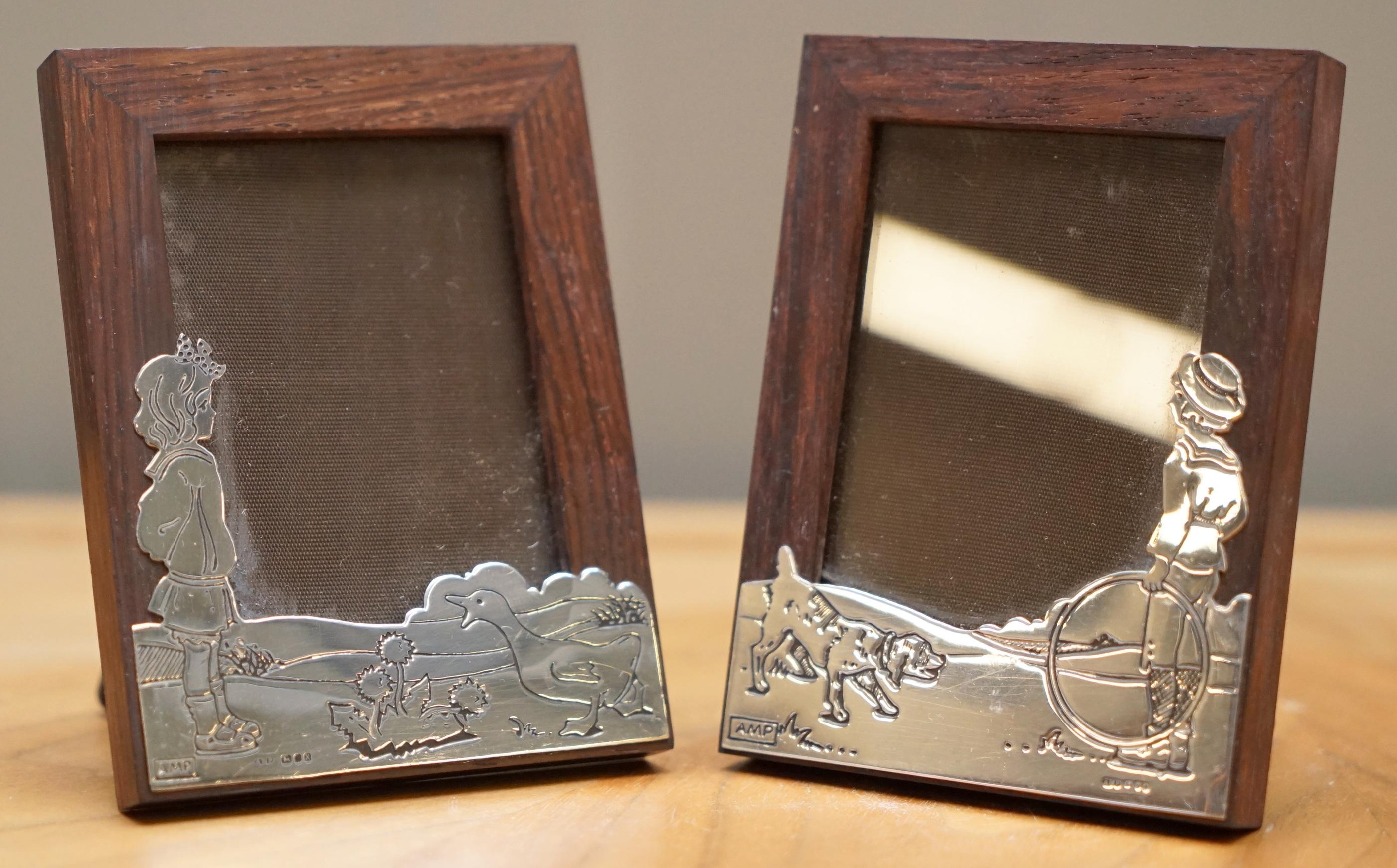 We are delighted to offer for sale this absolutely stunning pair of 1984 fully hallmarked sterling silver Asprey London Children’s picture frames

I have two other much larger Asprey London Art deco picture frames listed under my other