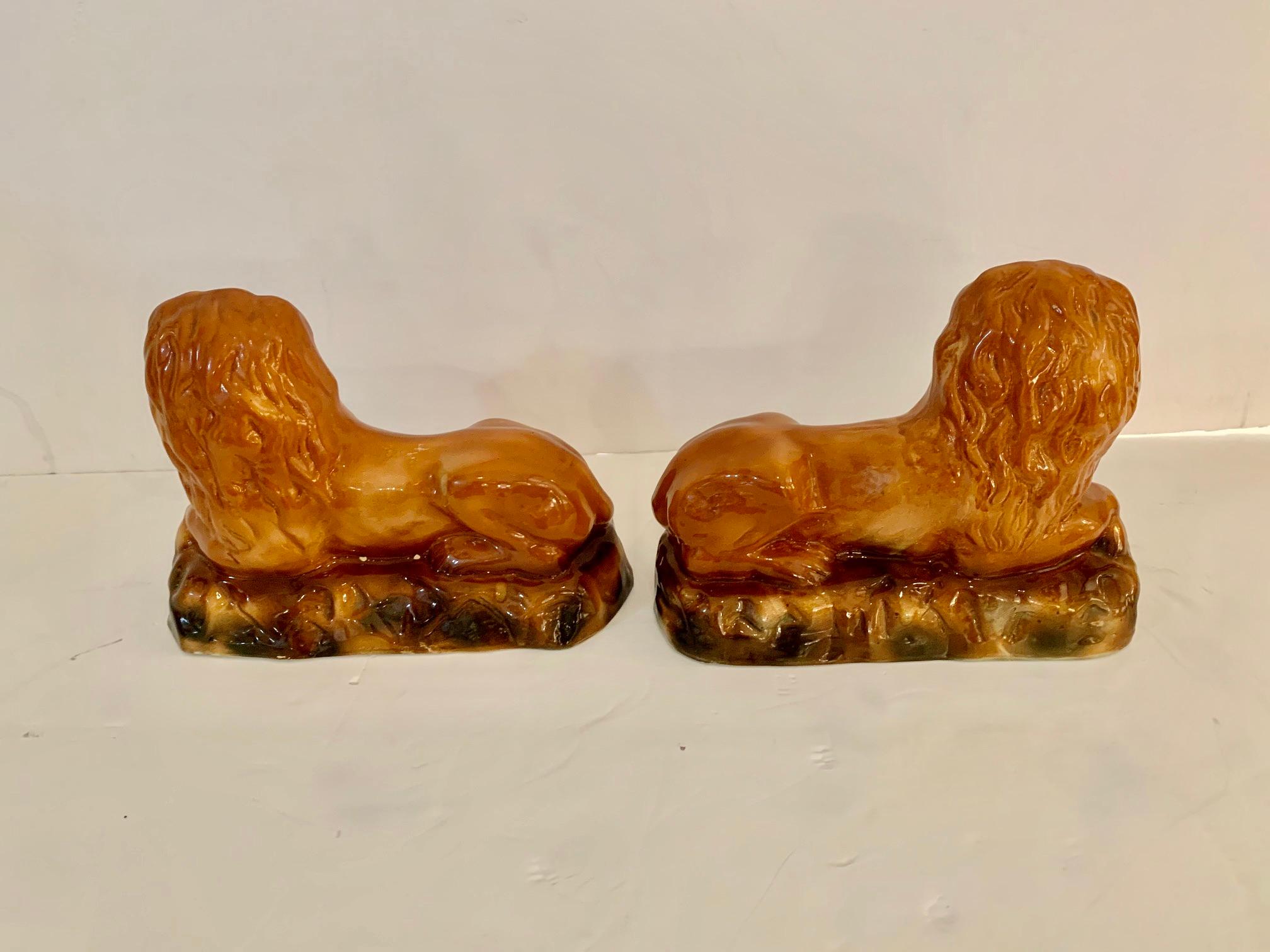 Rare Pair of 19th Century Antique Staffordshire Reclining Lions In Excellent Condition In Hopewell, NJ