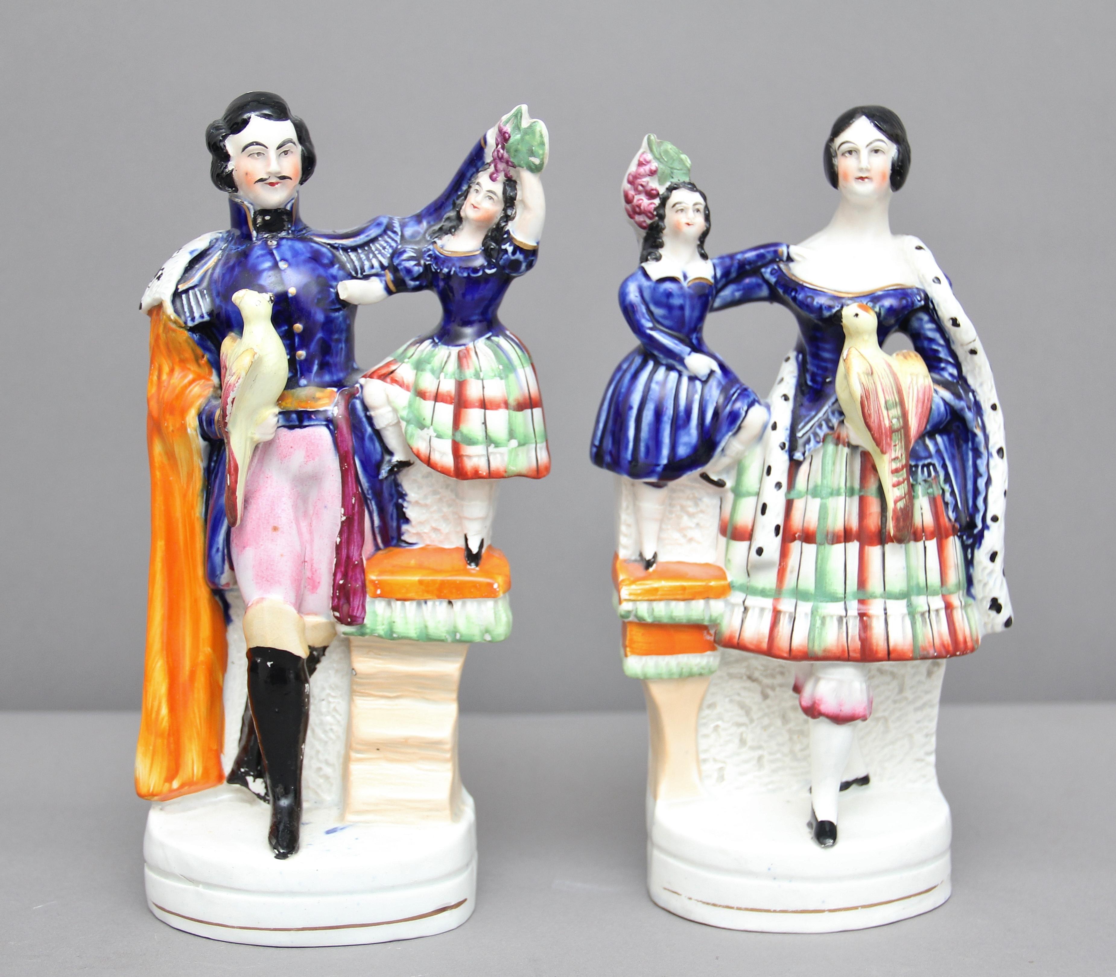 A fabulous rare pair of Staffordshire figures of Queen Victoria with a child and holding a parrot like bird, and Prince Albert also with a child and bird, sadly on this figure the child’s hand is missing, lovely colors and well moulded, circa 1840.