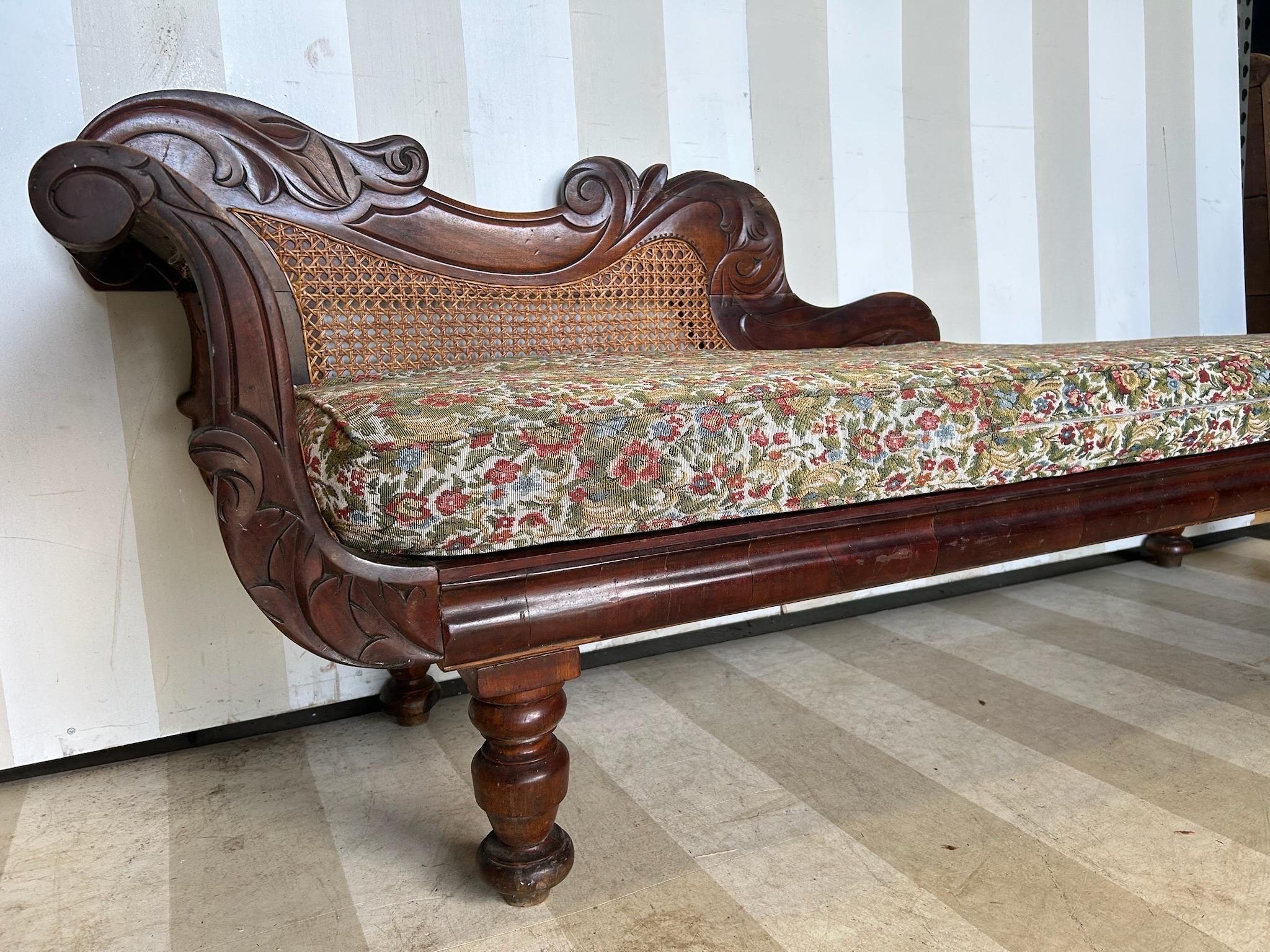 Rare pair of 19th Century West Indies Recamiers, Likely from Barbados or Jamaica. Fine hand carved west indian mahogany and hand caned. West Indian furniture is very rare to begin with, given how little was made and how much of that has been lost in