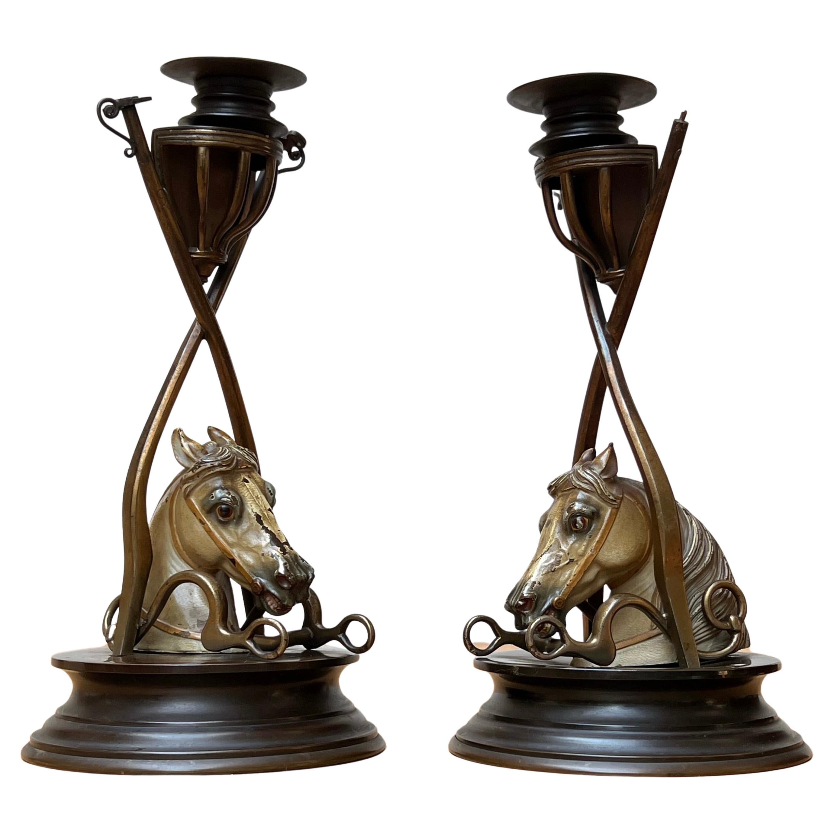 Practical size, antique bronze and brass candleholders for horse lovers.

If you are looking for one of a kind antiques to create the perfect atmosphere at home or in your office then this very attractive and highly decorative pair of horse theme