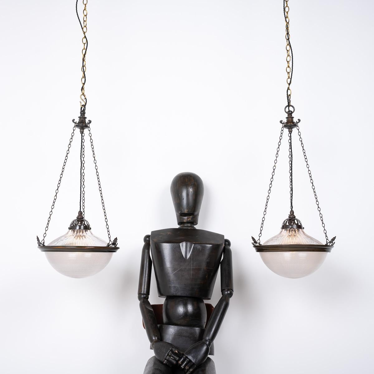 Antique 'Blondel Stiletto Bowl' Pendant Lights by Holophane (Pair)

Price is for the pair.

Discover a rare pair of 'Blondel Stiletto Bowl' pendant lights, crafted in England circa 1920 by Holophane.

Featuring stunning two-part prismatic glass bowl