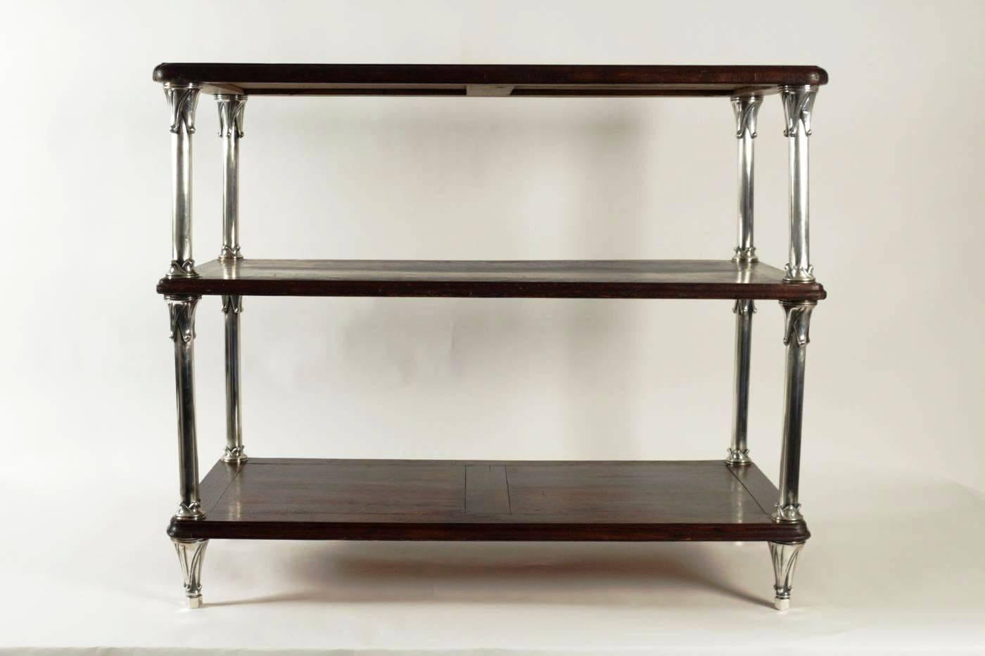 Rare pair of Art Deco period serving tables, three shelves in tainted oak and silver plate legs, France.