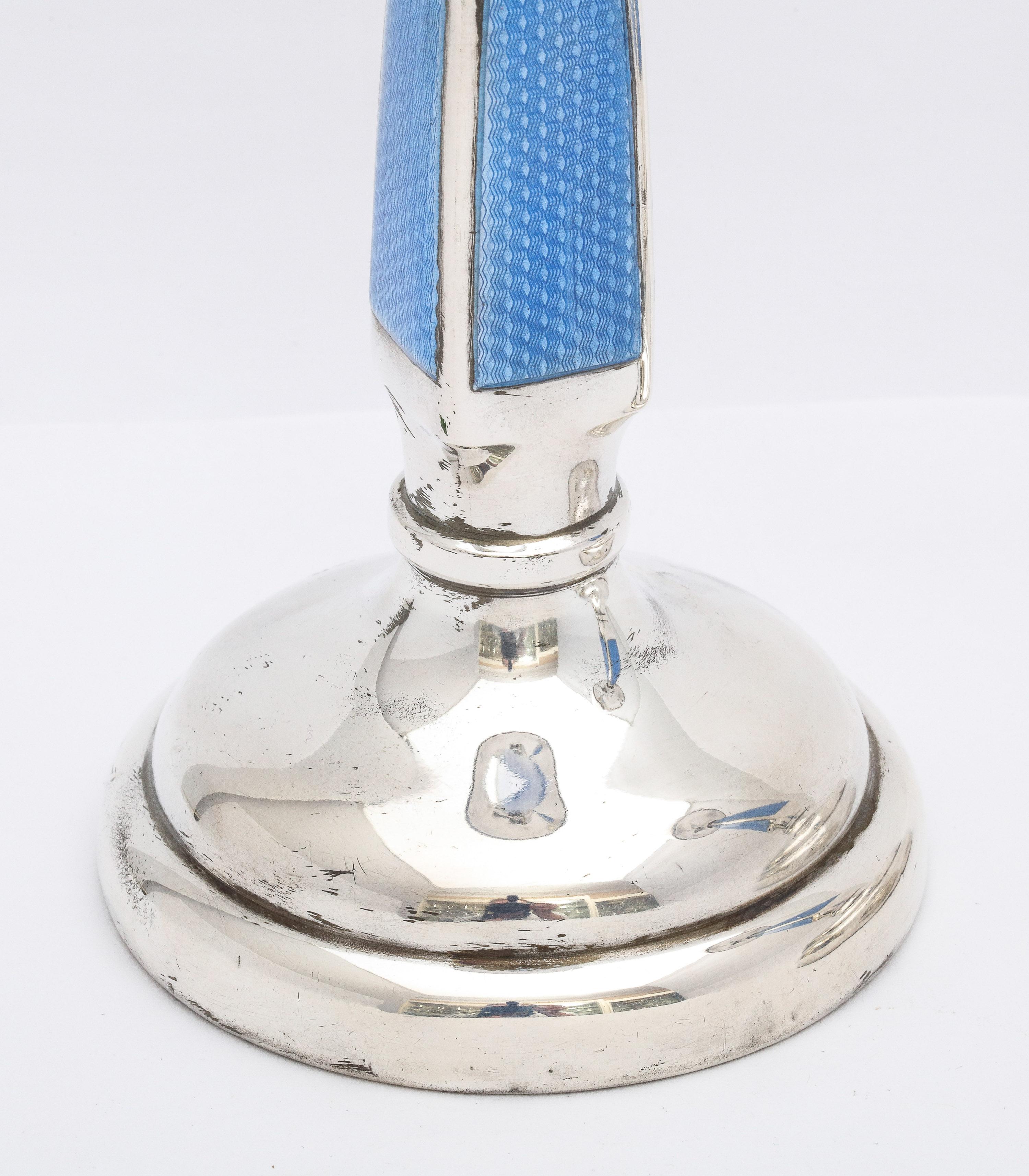 Early 20th Century Rare Pair of Art Deco Sterling Silver and Blue Guilloche Enamel Candlesticks For Sale