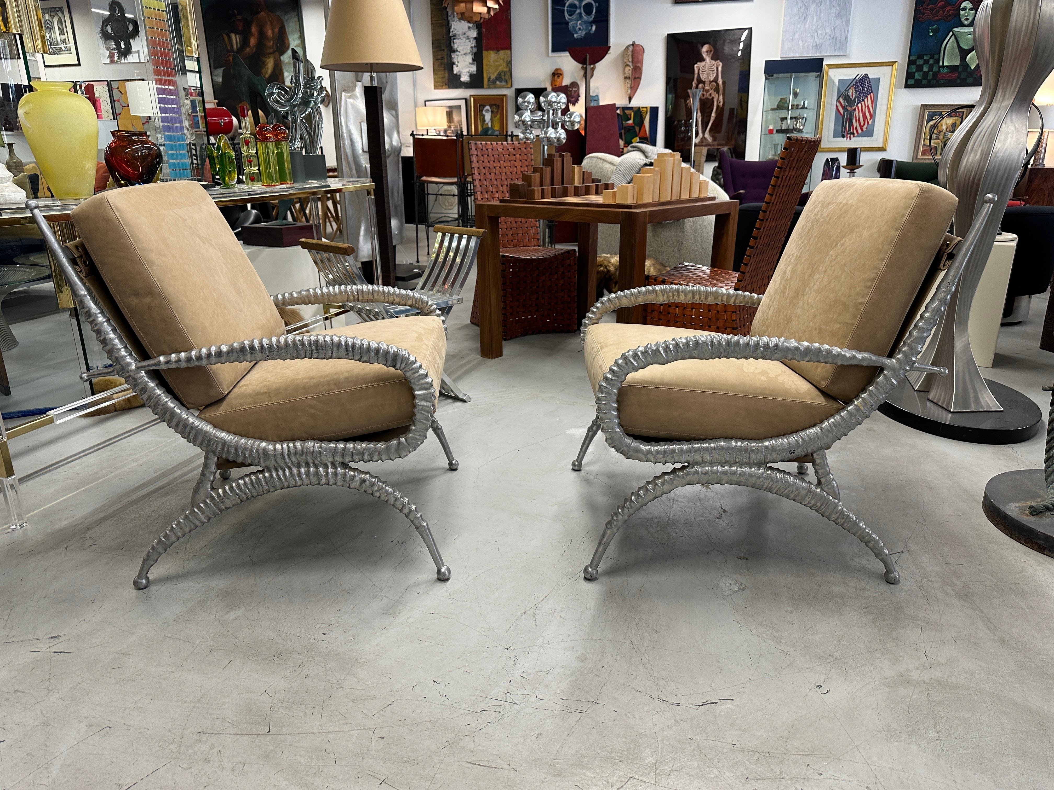 A rare pair of Arthur Court Sable chair from 1975 that we had redone in an Italian Nubuck Suede as the original were. These are pictured on page 94 in the book Arthur Court Designs 35 Years of Innovation by Arthur Court.  They are extremely
