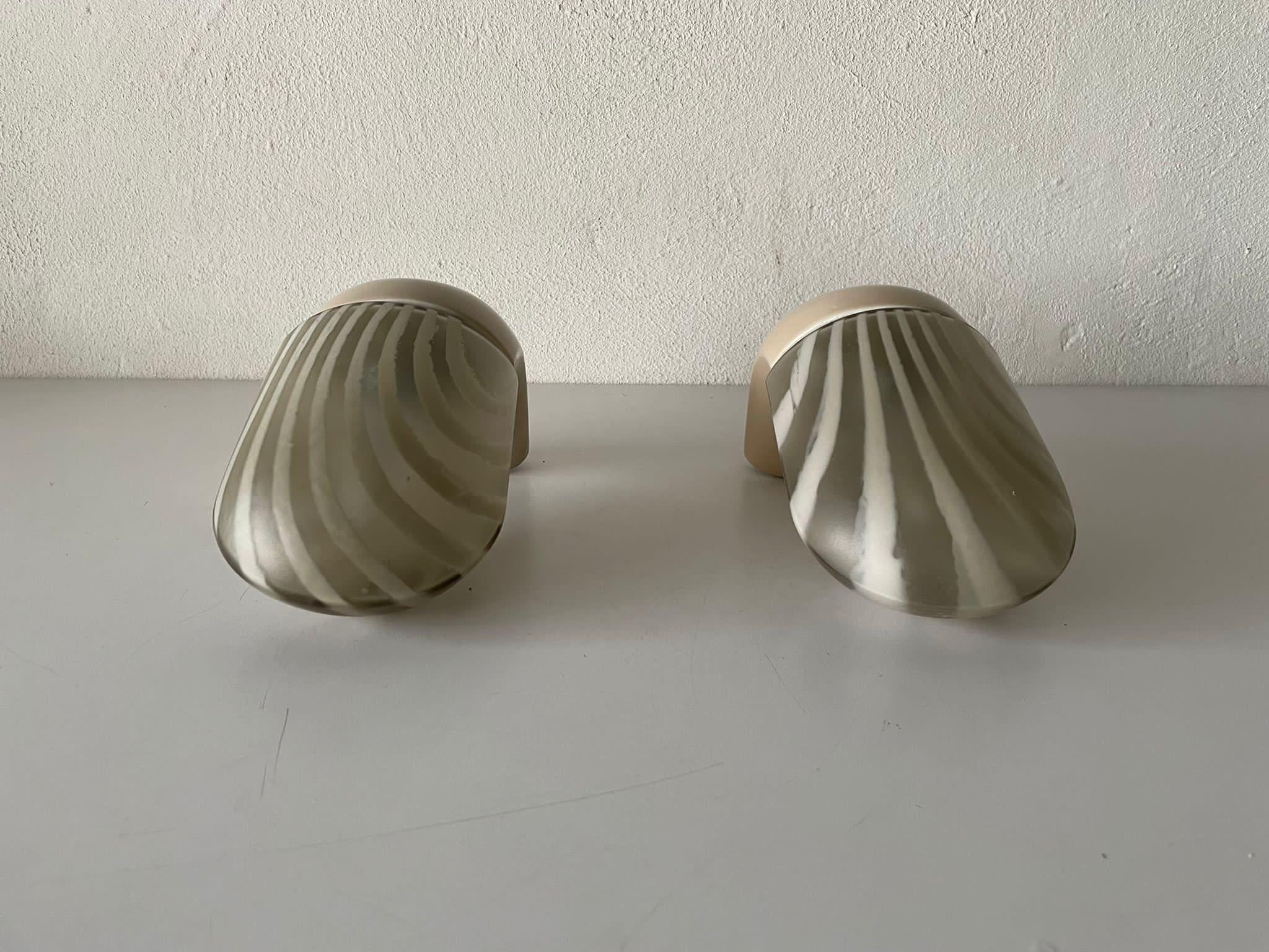 Rare pair of bathroom lamps by Peill Putzler, 1970s, Germany

Very elegant and Minimalist wall lamps

Lamps are in very good condition.

These lamps works with E14 standard light bulbs. Each lamp works with 1 light bulb. Max 40 W
Wired and