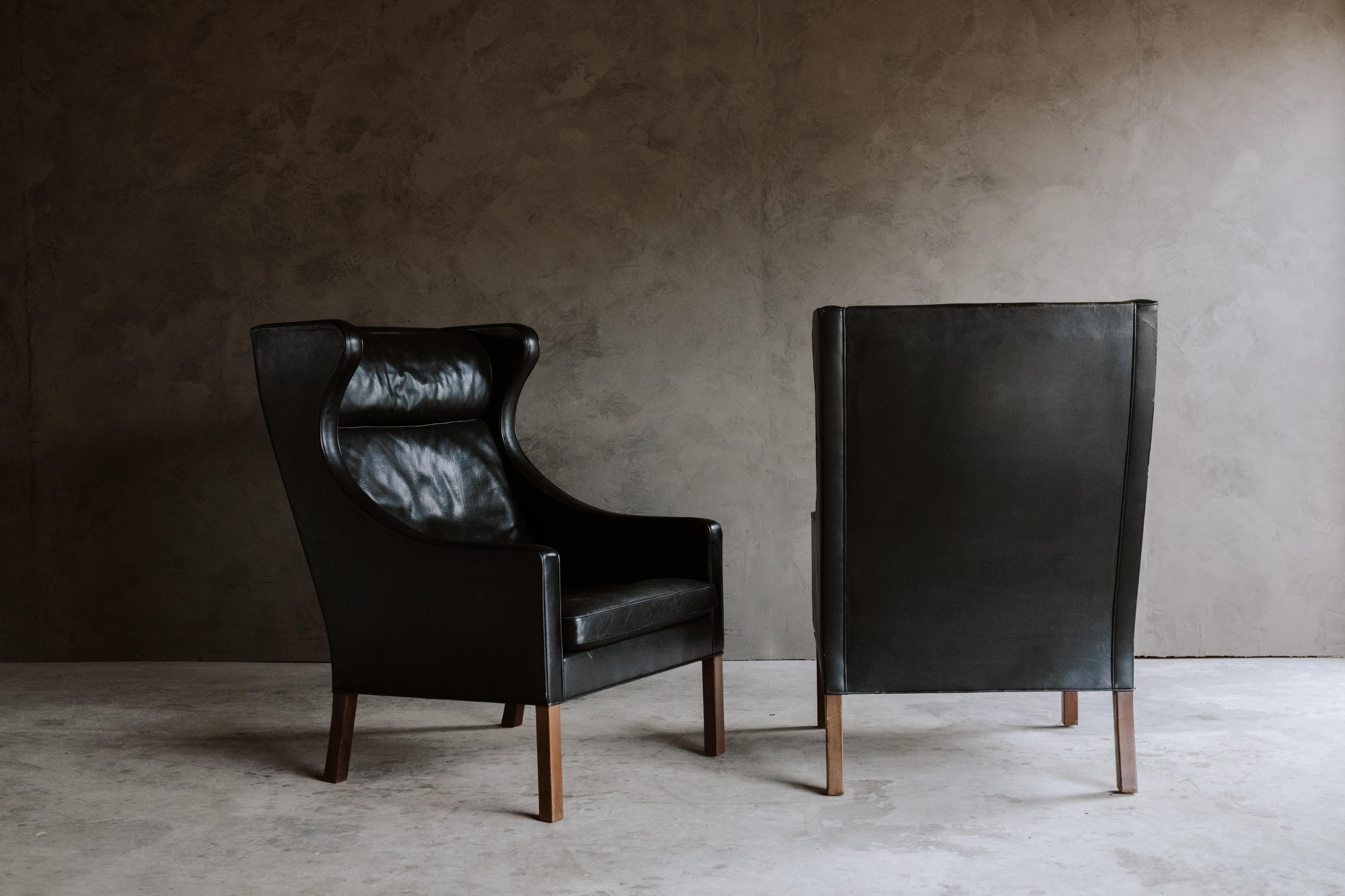 Leather Rare Pair of Børge Mogensen Wingback Chairs, Denmark, 1970s
