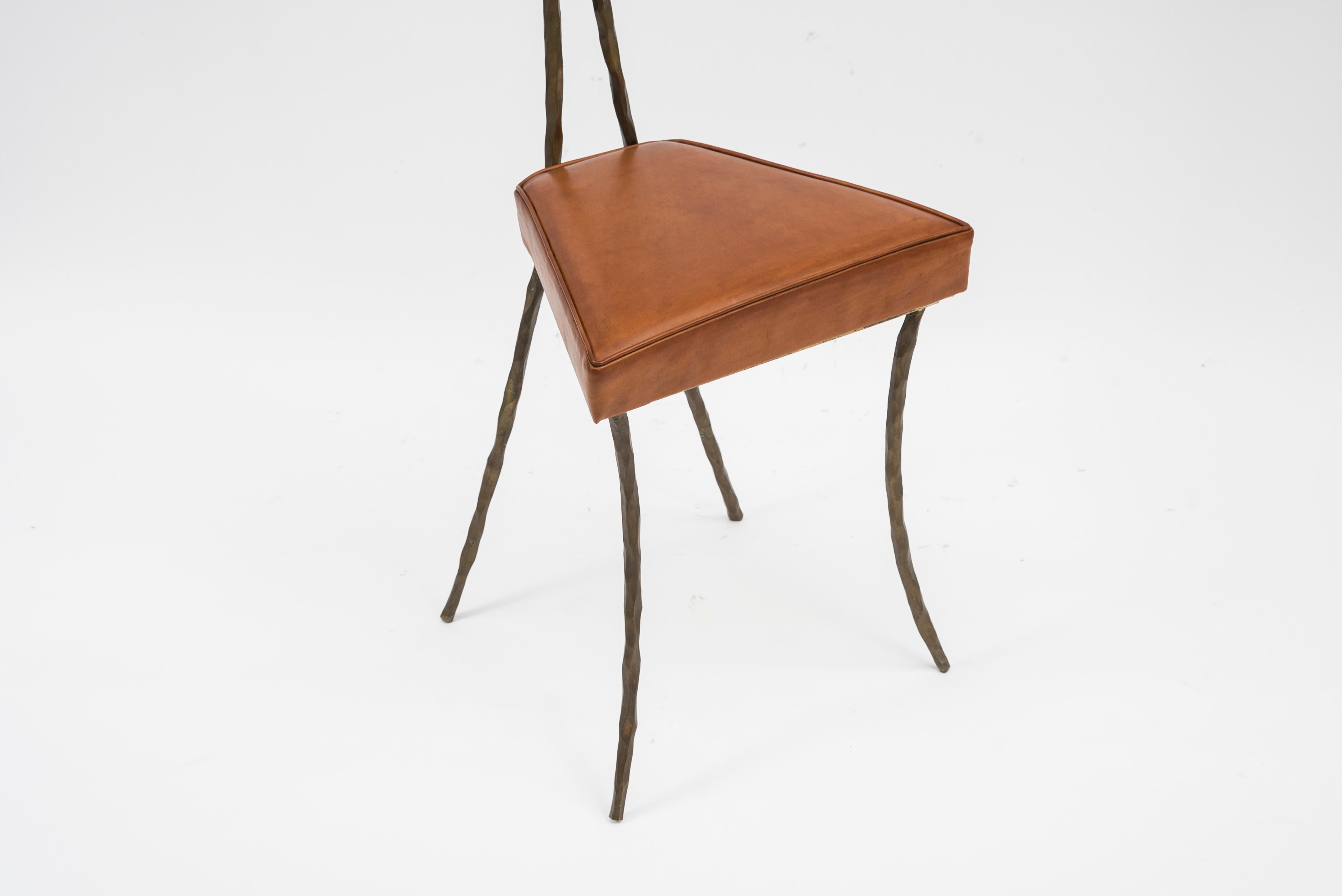 Bronze chair with leather seat
Can be sold one by one
France
1980s.