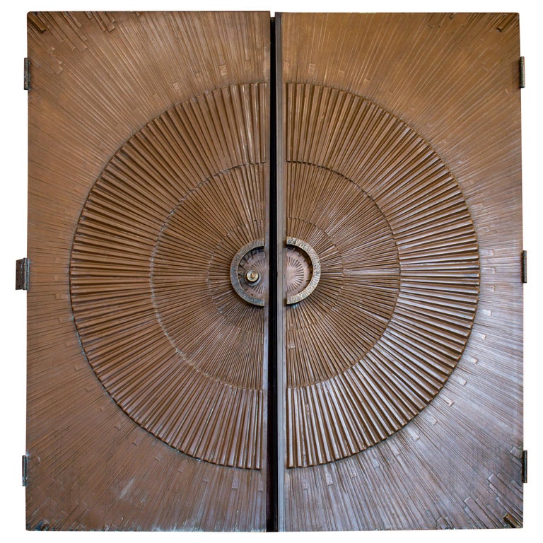 Pair of bronze covered sunburst doors, 1971, offered by Ken Bolan Studio