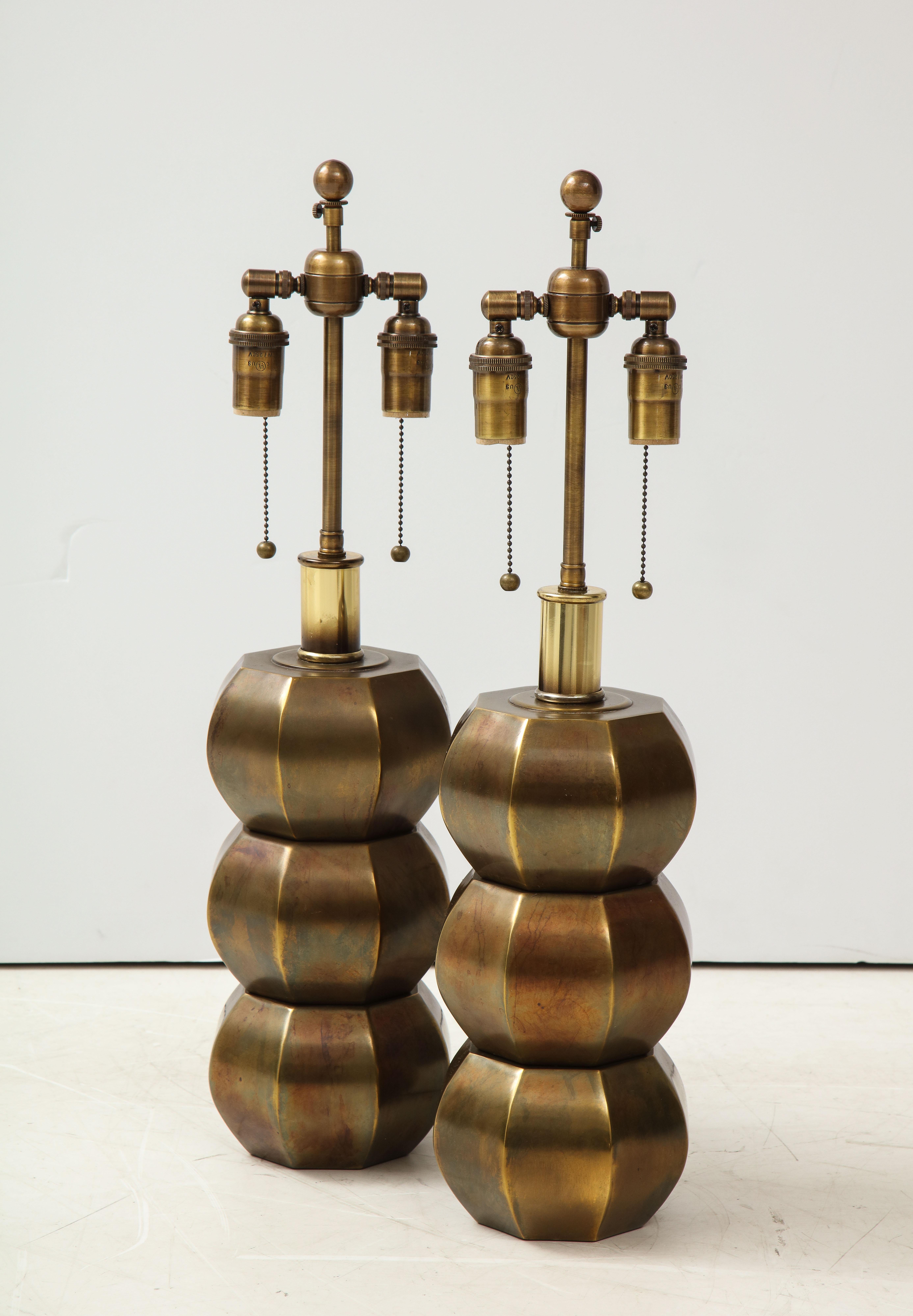 Stunning pair of rare faceted sphere lamps in an antique bronzed finish.
The lamps have been Newly rewired with rayon cords and adjustable Antique Bronze double clusters
that take standard light bulbs.