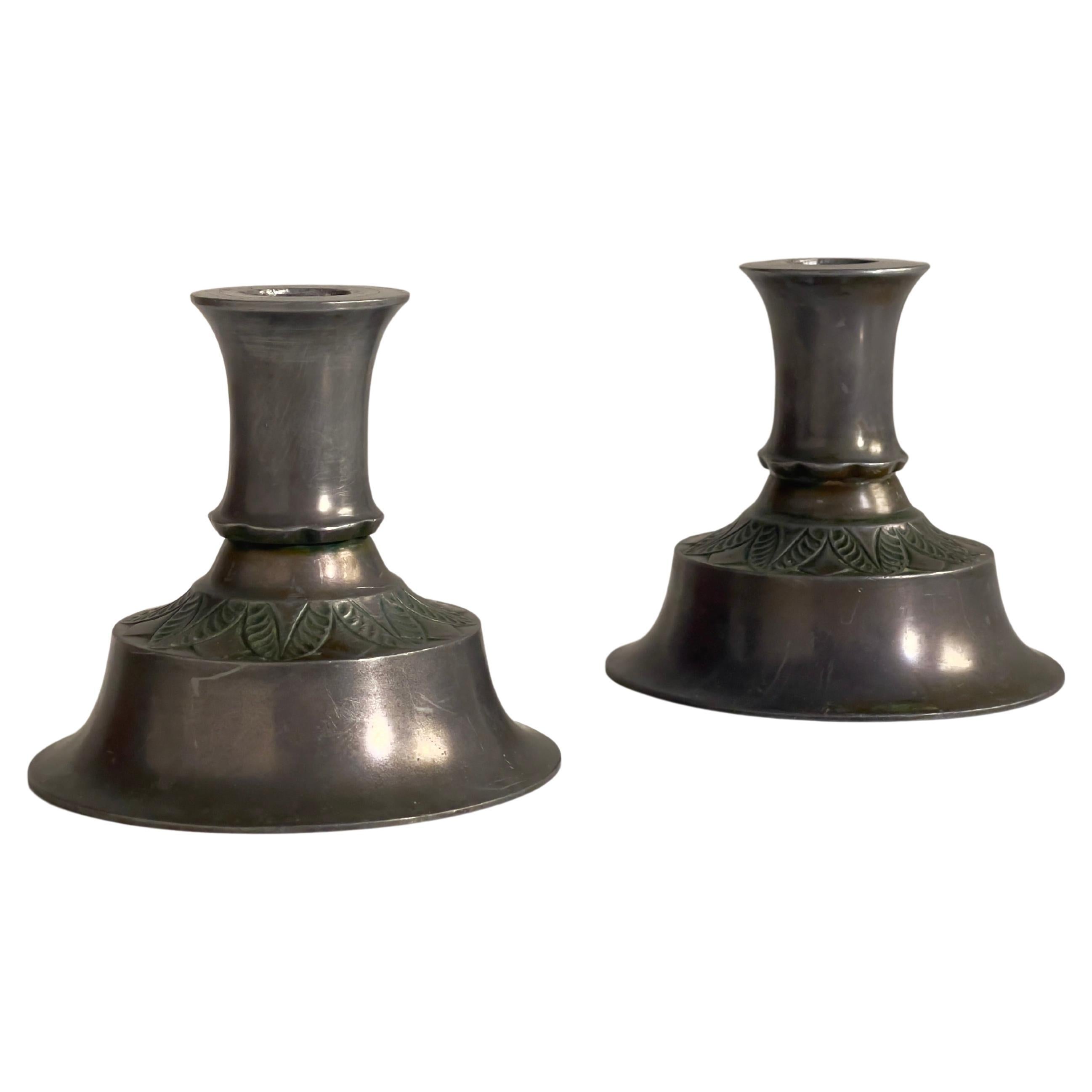 Rare pair of candlesticks by Danish sculpture and silversmith Just Andersen 1920 For Sale