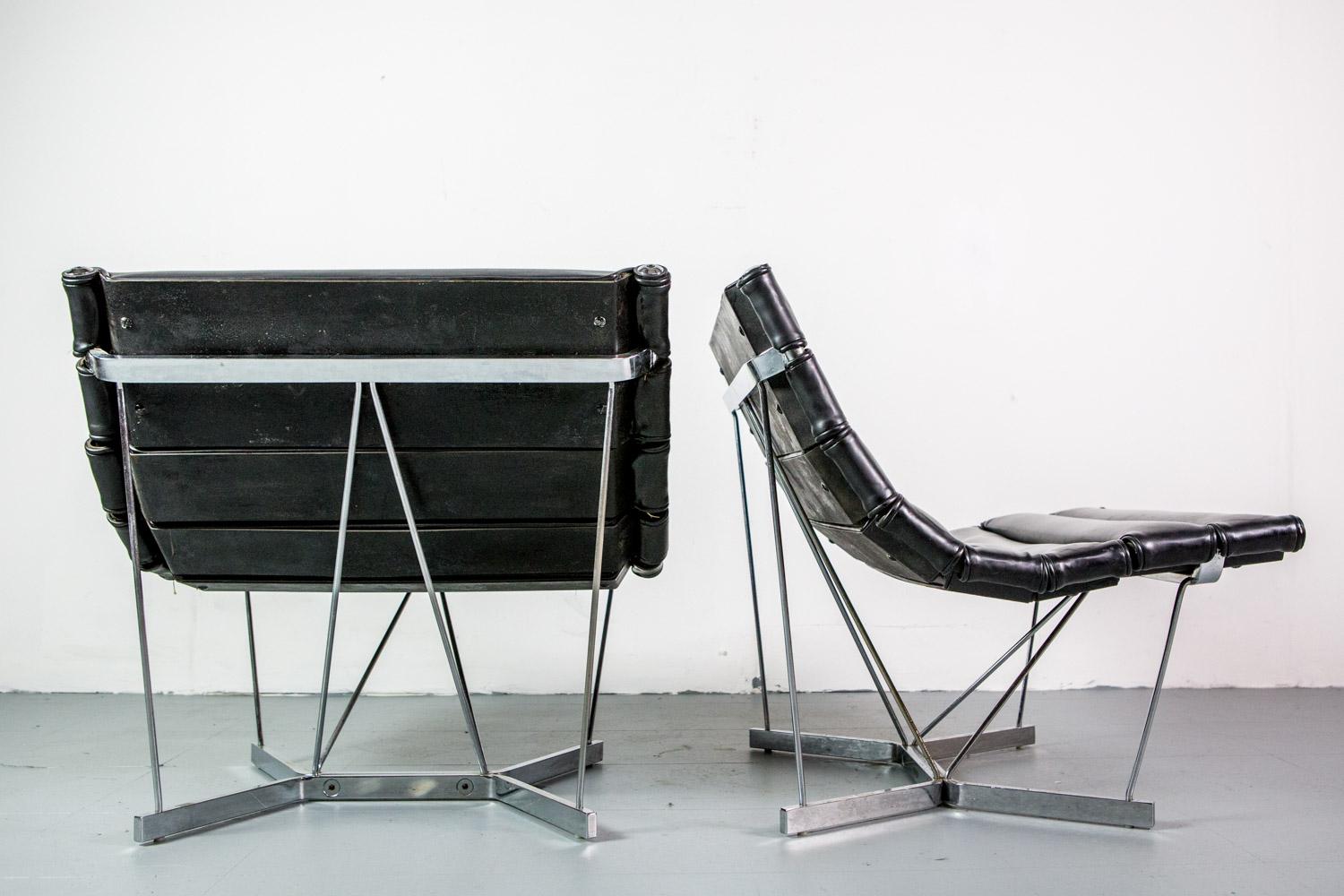 Rare pair of Catenary chairs by George Nelson for Herman Miller in original black leather.