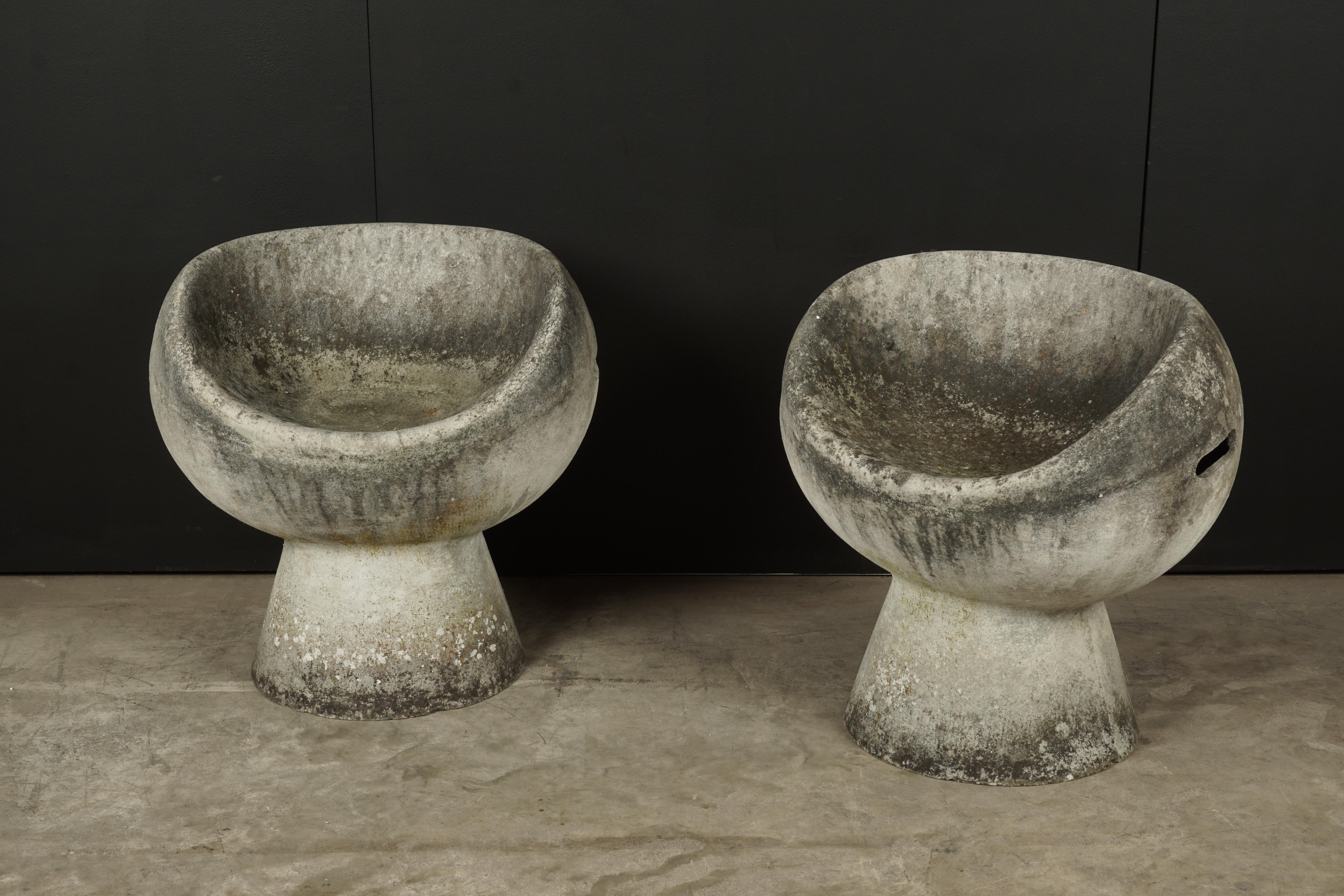 Rare pair of concrete pod chairs by Willy Guhl, Switzerland, circa 1960. Fantastic pair with great patina and condition.