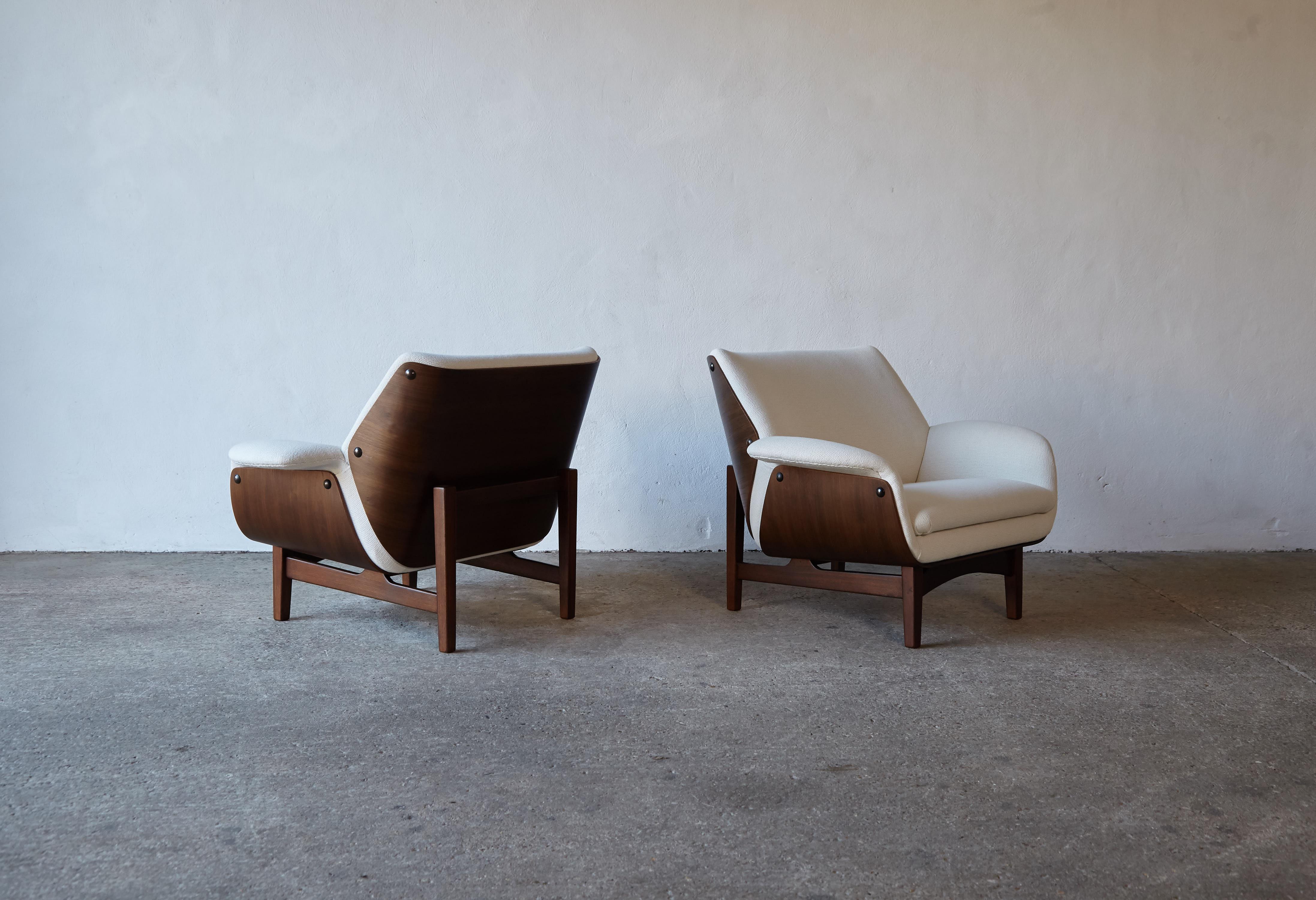 A very rare sculptural pair of lounge chairs, by Charles Joosten for Interstyle, Italy, 1960s. Walnut frames with comfortable seats newly upholstered in Larsen fabric. Fast shipping worldwide.
  


UK customers please note - listed prices here