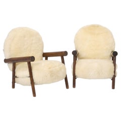 Rare pair of Charlotte Perriand Armchairs For Hotel La Cachette Les Arcs 1950's