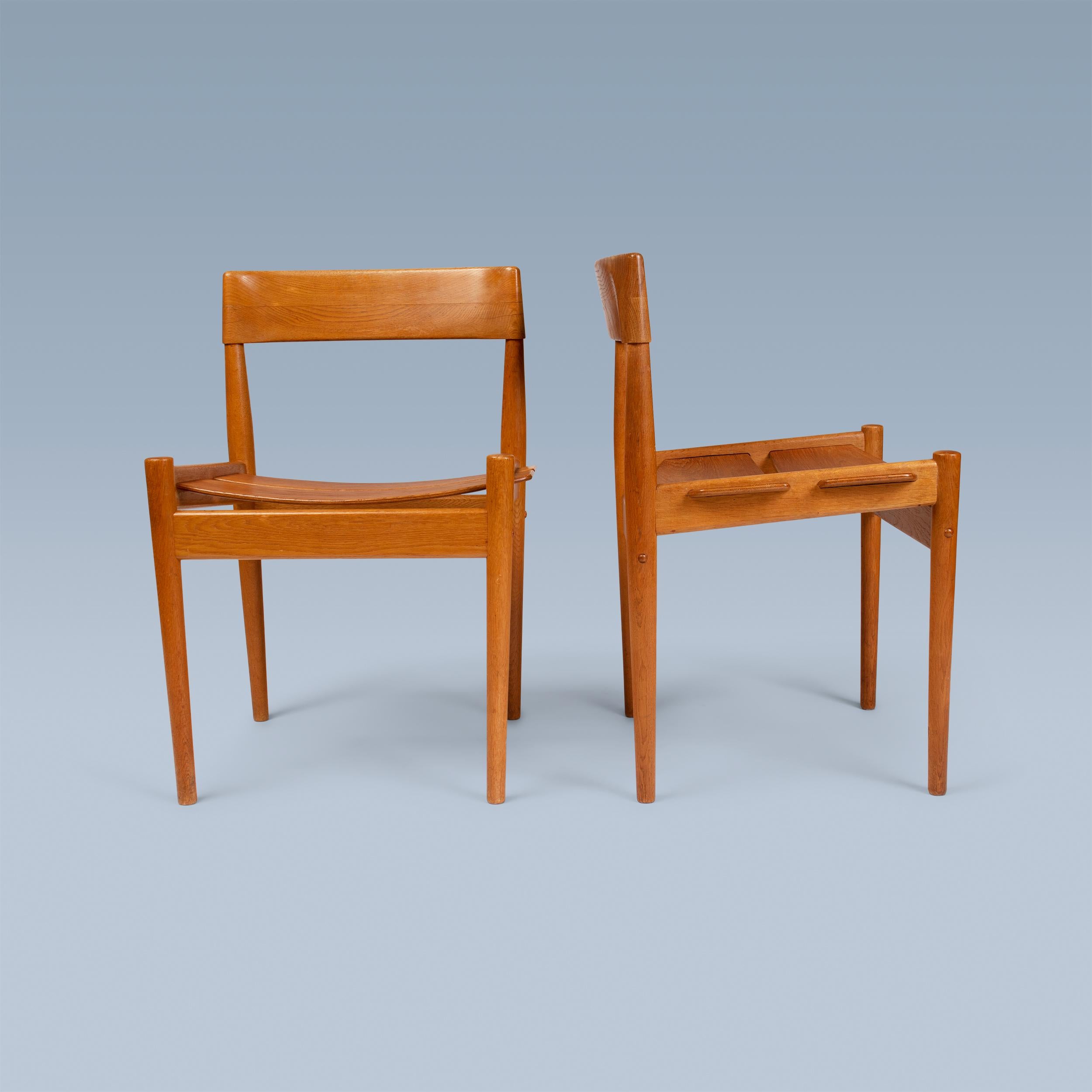 Oak Rare pair of Danish modern fumed oak side chairs For Sale