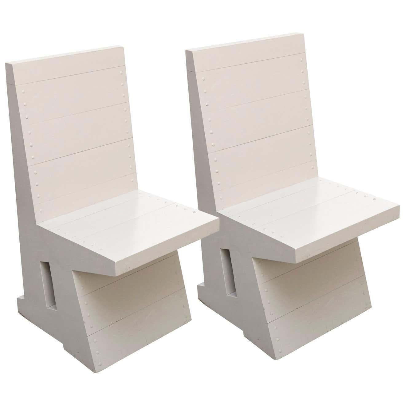 Presenting a remarkable pair of easy chairs designed by the acclaimed architect and designer Dom Hans van der Laan for the Abbey Church of St. Benedictusberg in Vaals, Netherlands. This pair, manufactured circa 1980, showcases the timeless design