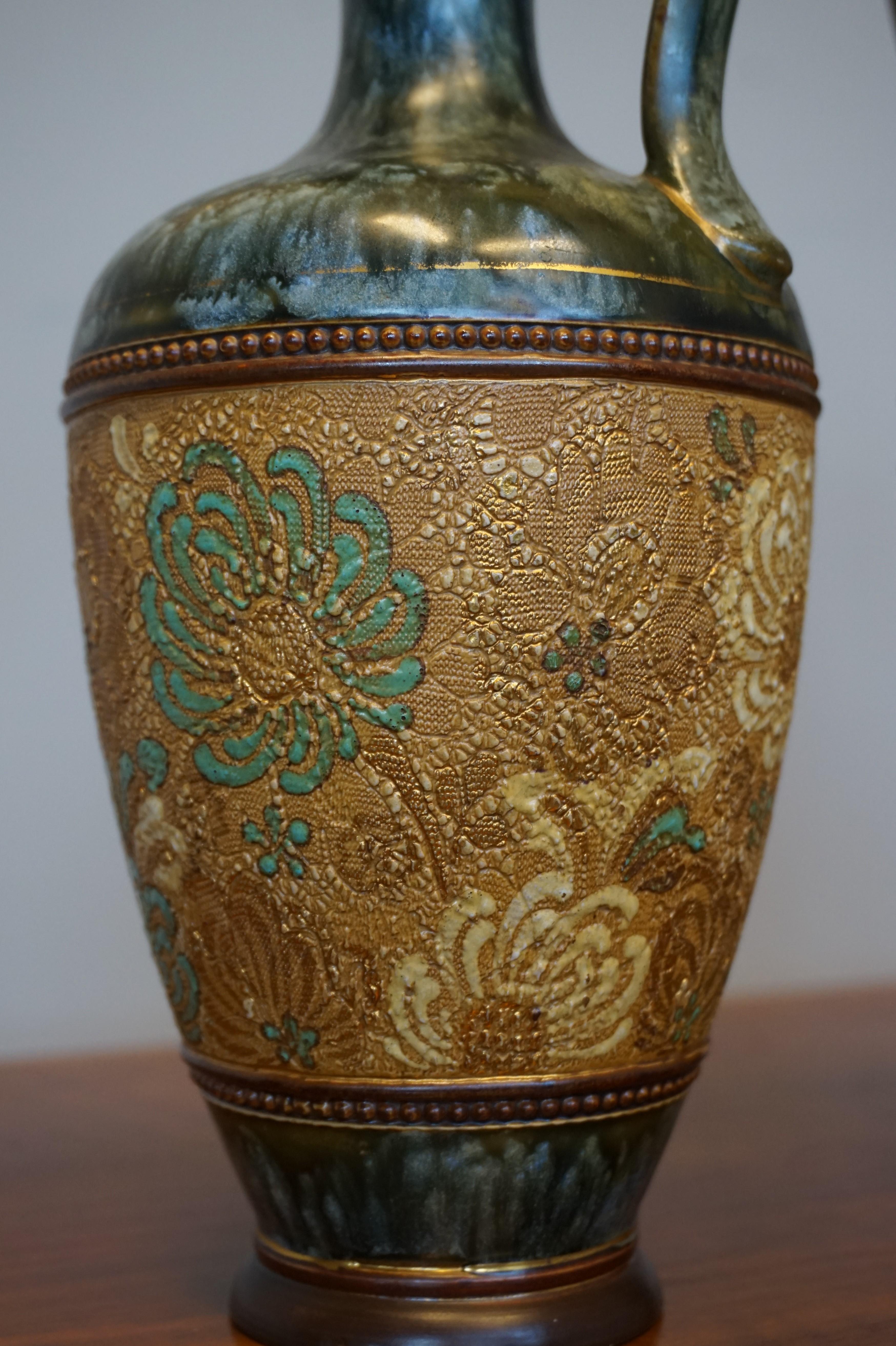 Glazed Rare Pair of Doulton Lambeth Vases with Striking Golden & Enameled Flower Decor For Sale