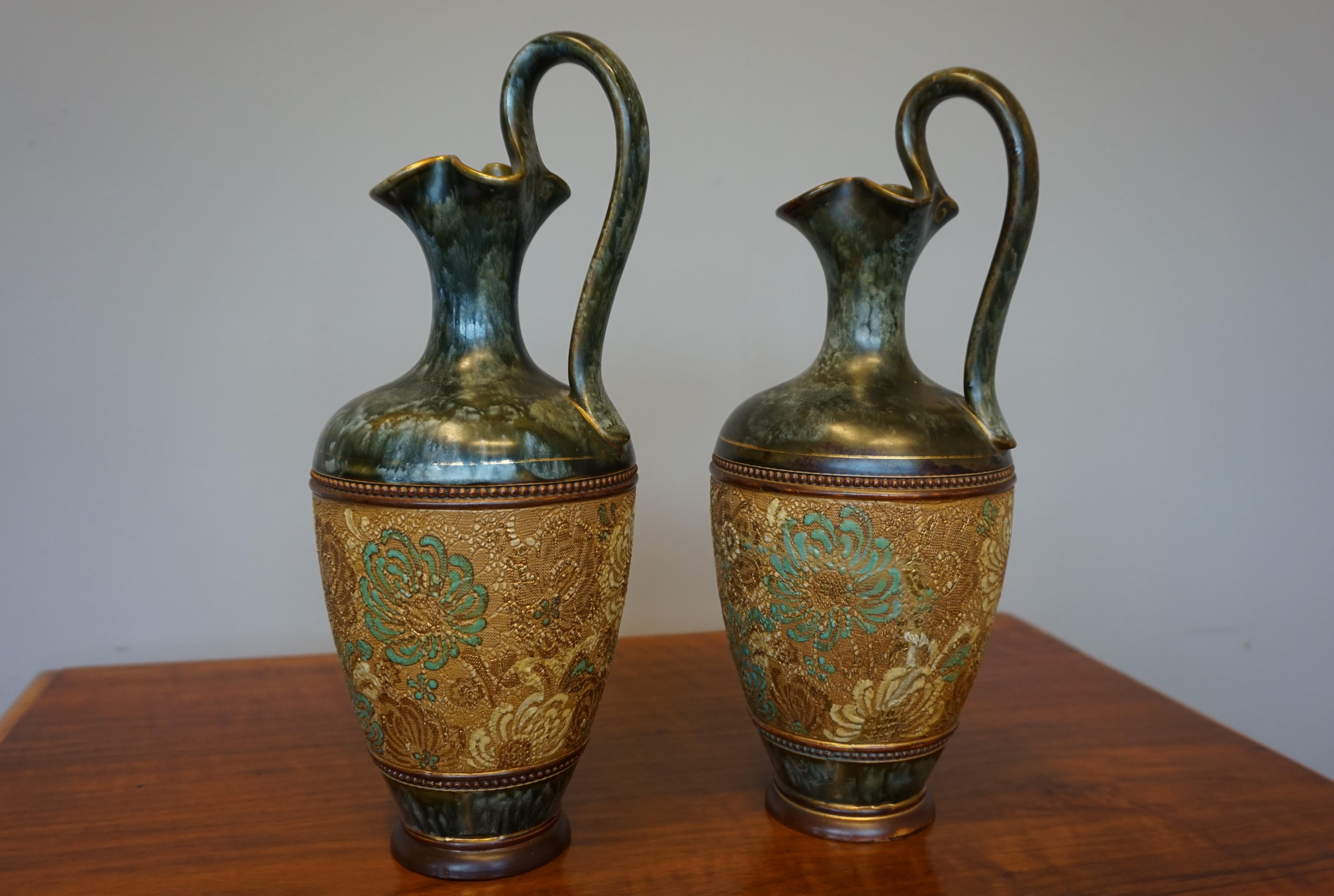 Earthenware Rare Pair of Doulton Lambeth Vases with Striking Golden & Enameled Flower Decor For Sale