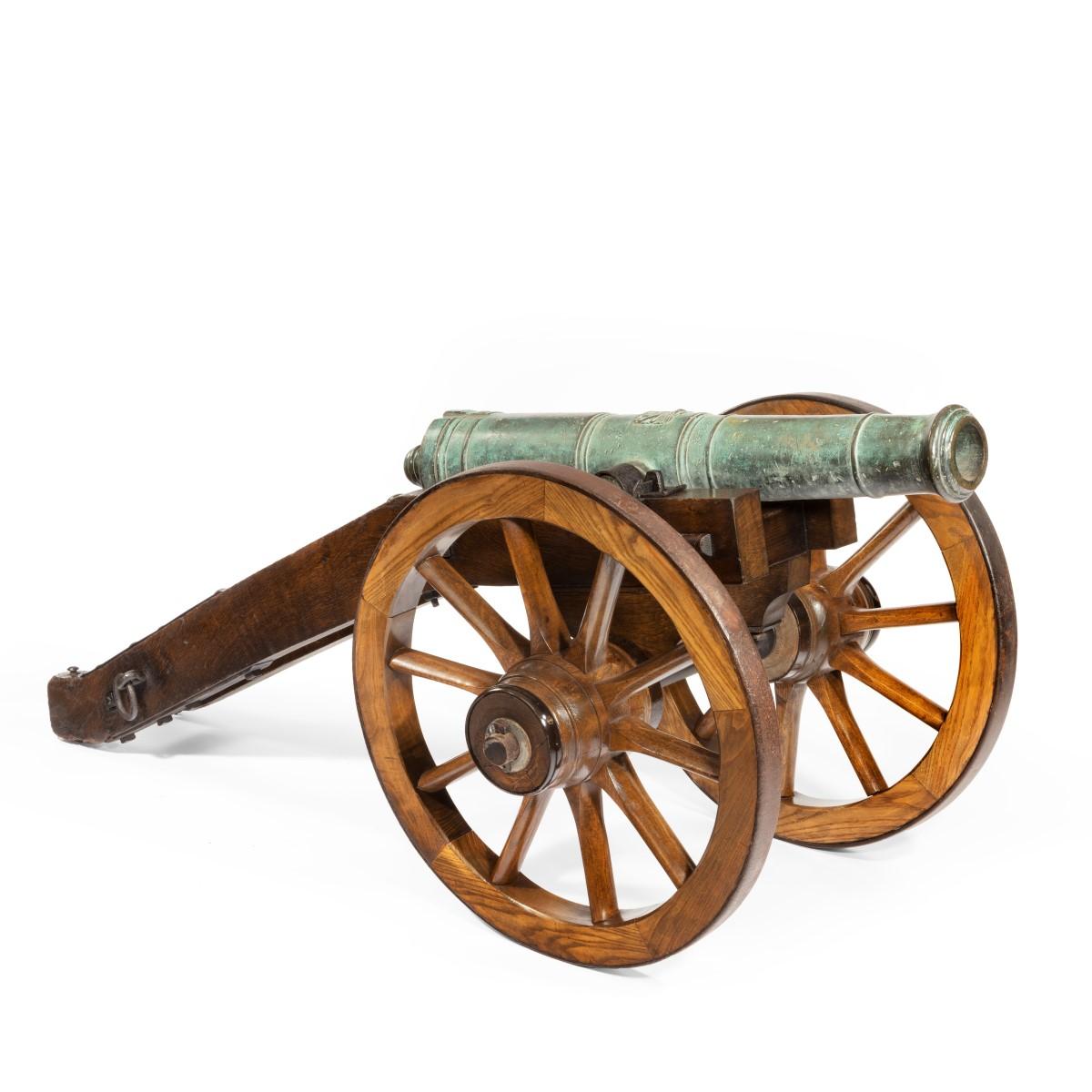A rare pair of early 18th century Venetian Cannon, cast in bronze, with the insignia of the Lion of St Mark on the barrels, mounted on later carriages, Venice, circa 1720.

Measures: Length of cannons: 41 in (103 cm) 
Overall length of carriage: