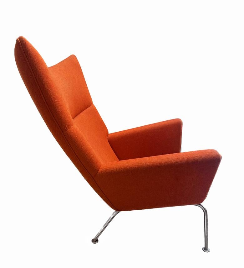 We have for sale a stunning pair of original, early wing chairs, designed by Hans J. Wegner for Carl Hansen. These chairs are a perfect addition to any modern or contemporary living space, offering both timeless style and comfort.

The design of