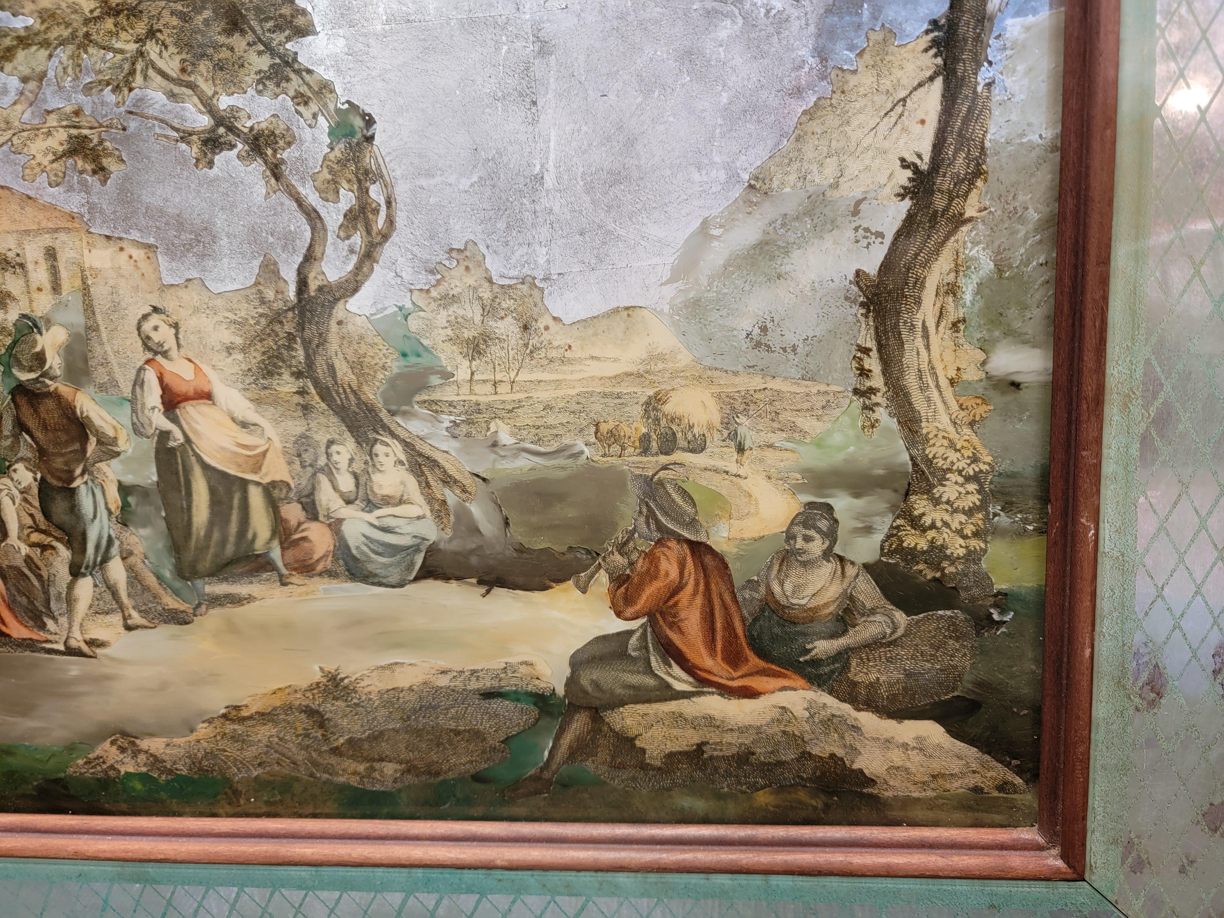 Rare pair of hand painted reveres mirrored eglomise paintings The borders are mirrors with that extend outward and have a mint green outline with  cross sections throughout. Depicting a scene of dancing out doors and the other scene is of a man