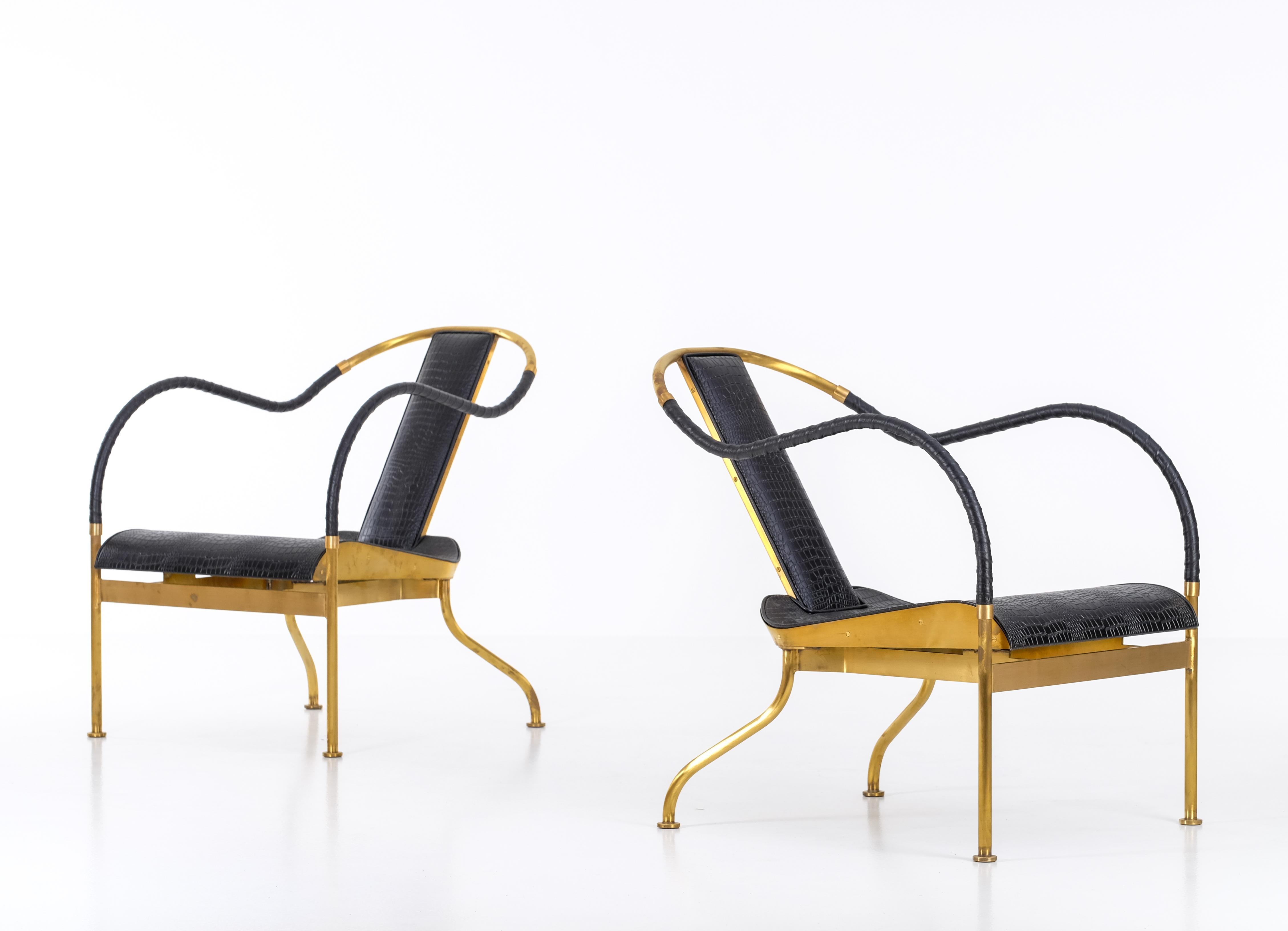 Brass frame, seat and back in crocodile patterned prime leather. Leatherclothes-wound armrests. Limited edition of 360 chairs produced in 1999. This is chair #146 and #239.
Excellent condition.