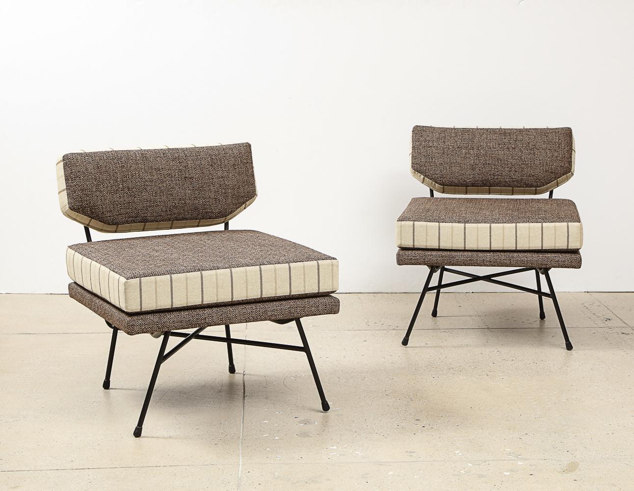 Enameled steel and fabric, rubber. A rare pair of original Elettra lounge chairs by Studio BBPR (Gianluigi Banfi (1910-1945), Lodovico Barbiano di Belgiojoso (1909-2004), Enrico Peressutti (1908-1976), and Ernesto Nathan Rogers (1909-1969). The