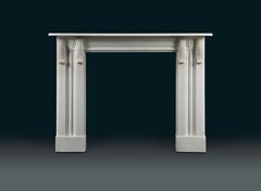 Pair of 19th Century English, Late Regency, Statuary Marble Fireplaces