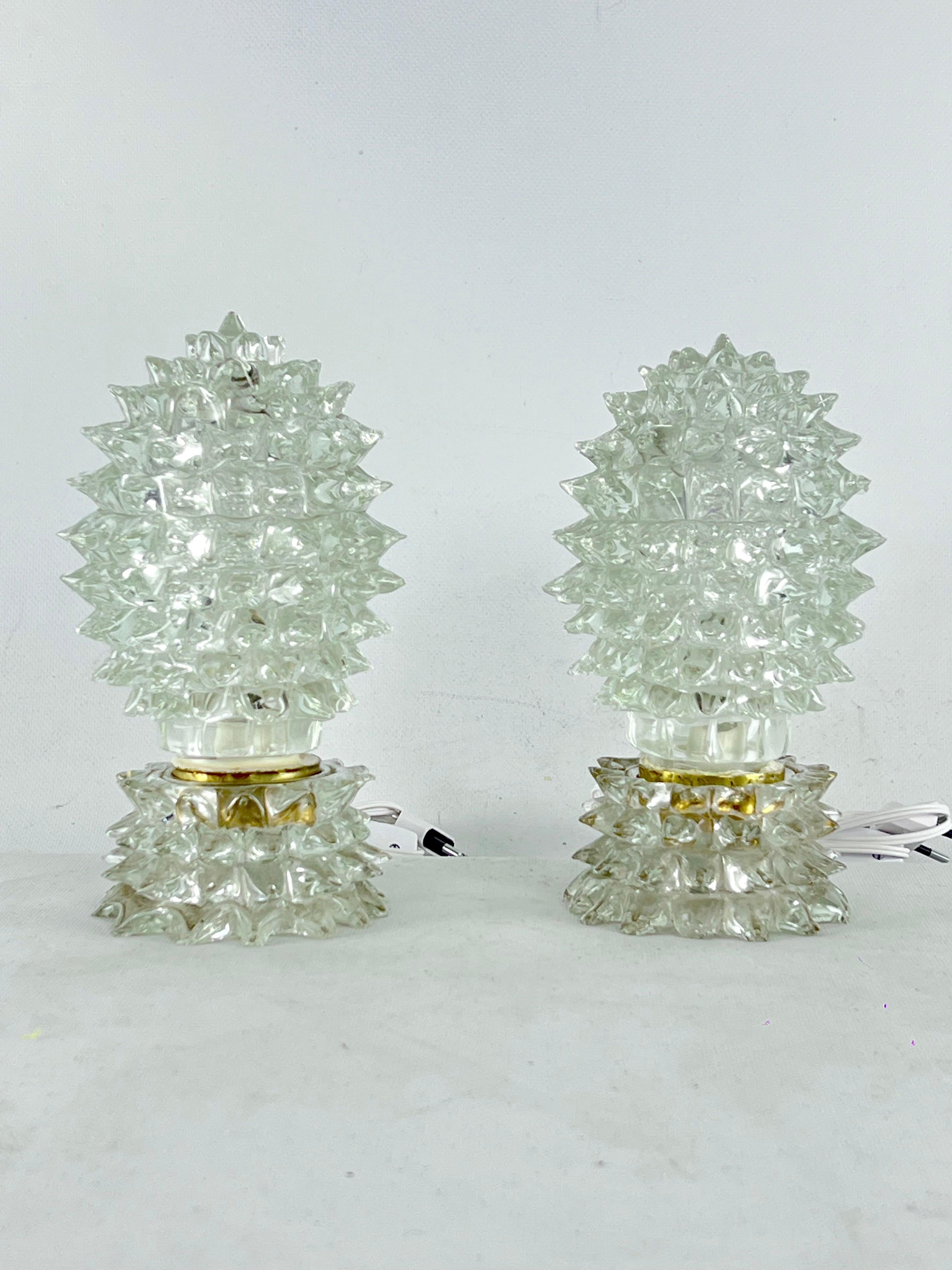 Great vintage condition for this rare pair of Ercole Barovier rostrato table lamps produced in Italy during the 1940s. No cracks or other damages but small chips in some tips. Full working with EU standard, adaptable on demand for USA standard.