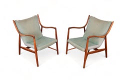 Rare Pair Of Finn Juhl Nv45 Lounge Chairs In Teak