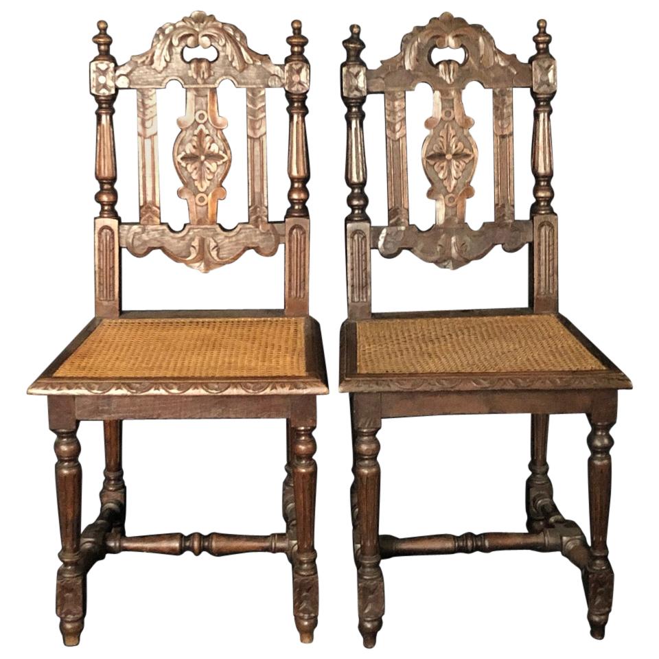 Rare Pair of French Carved 19th Century Henri II Oak Chairs with Caned Seats