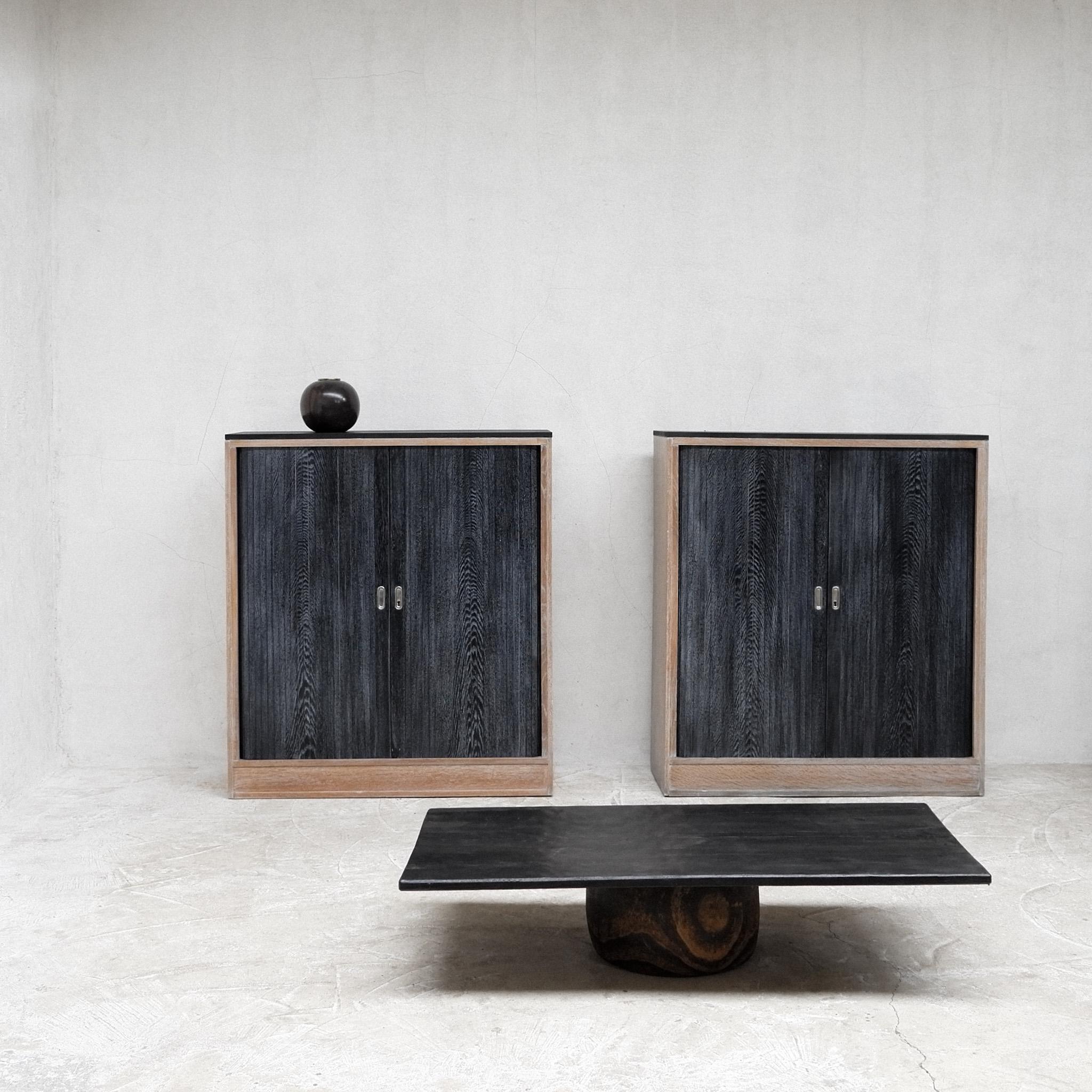 An exceptional rare pair of French modernist limed oak tambour cabinets.

Two tone with ebonised limed oak fronts.

Ebonised pine tops.

Lockable with three adjustable interior shelves.

Both incredibly stylish & practical.

-

We offer free