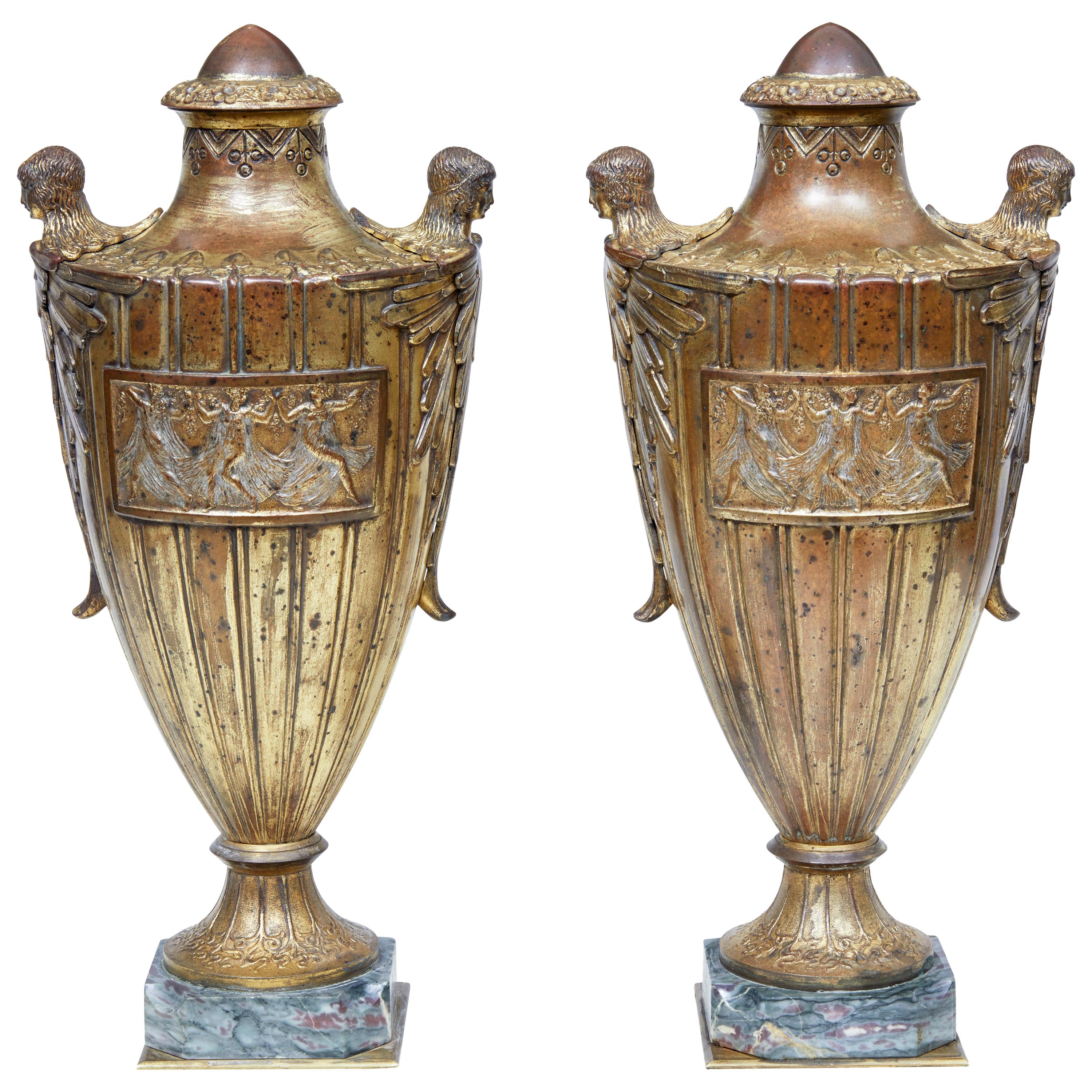Rare Pair of French Solid Bronze and Gilt Decorative Urns