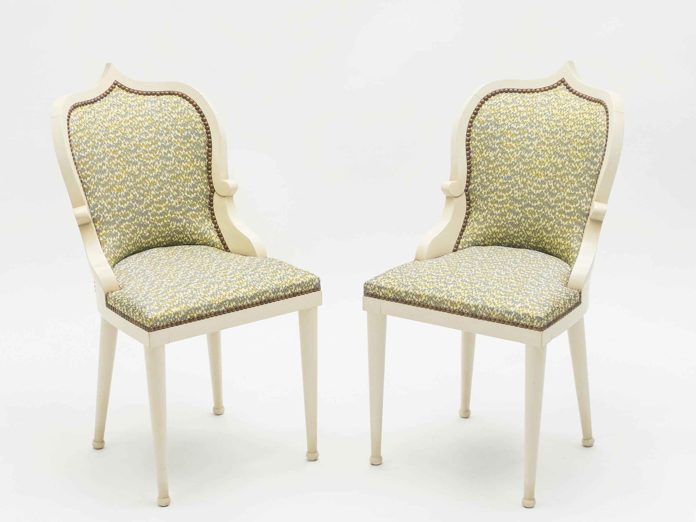This is a rare pair of chairs by Elizabeth Garouste & Mattia Bonetti, model Palace, made in white cream painted solid oak. Garouste & Bonetti began their collaboration and gained global recognition for their interior design of the Paris nightclub Le