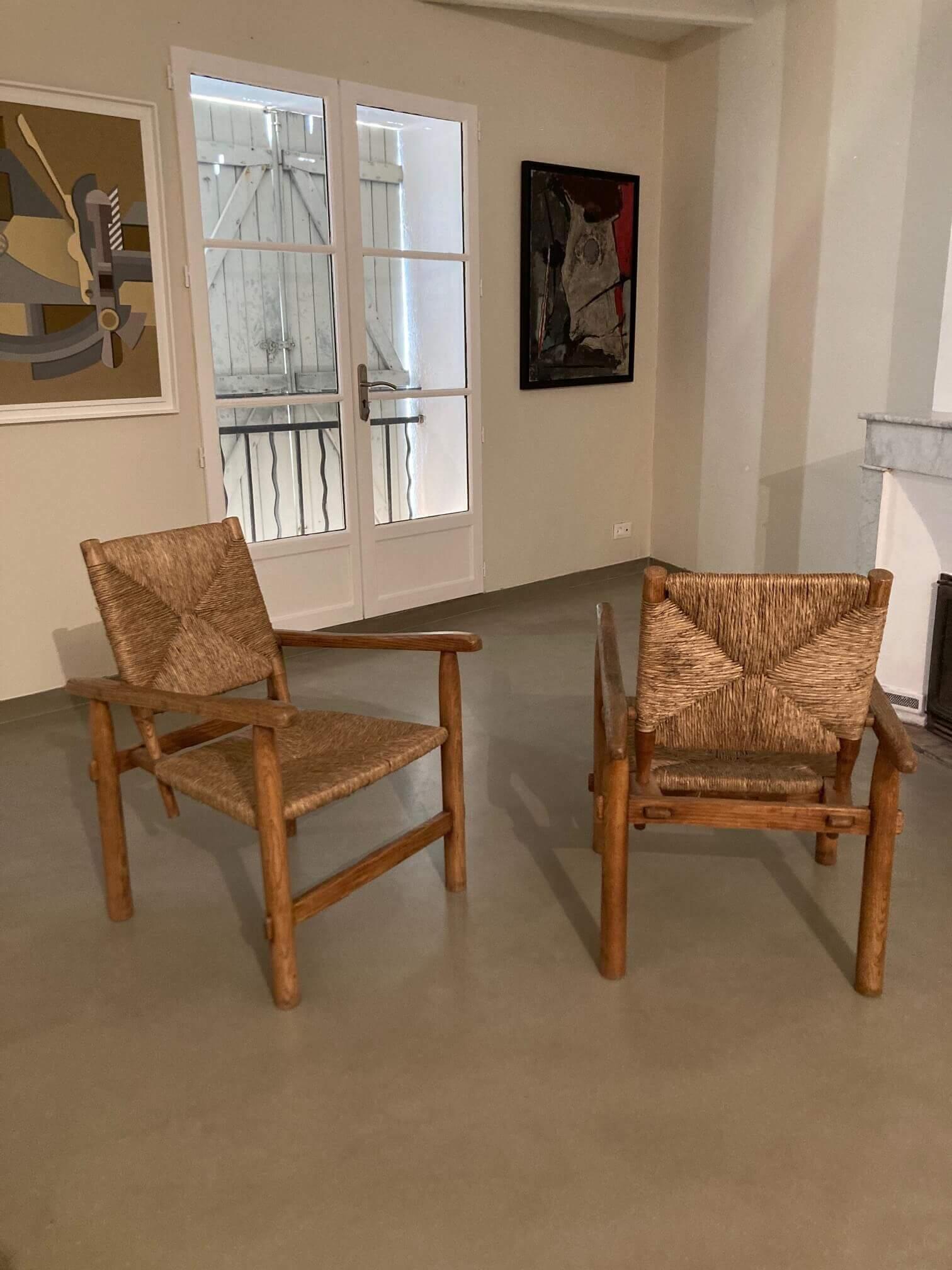 Milieu du XXe siècle Paire de fauteuils authentiques authentiques, originaux, par Charlotte Perriand, vers 1945