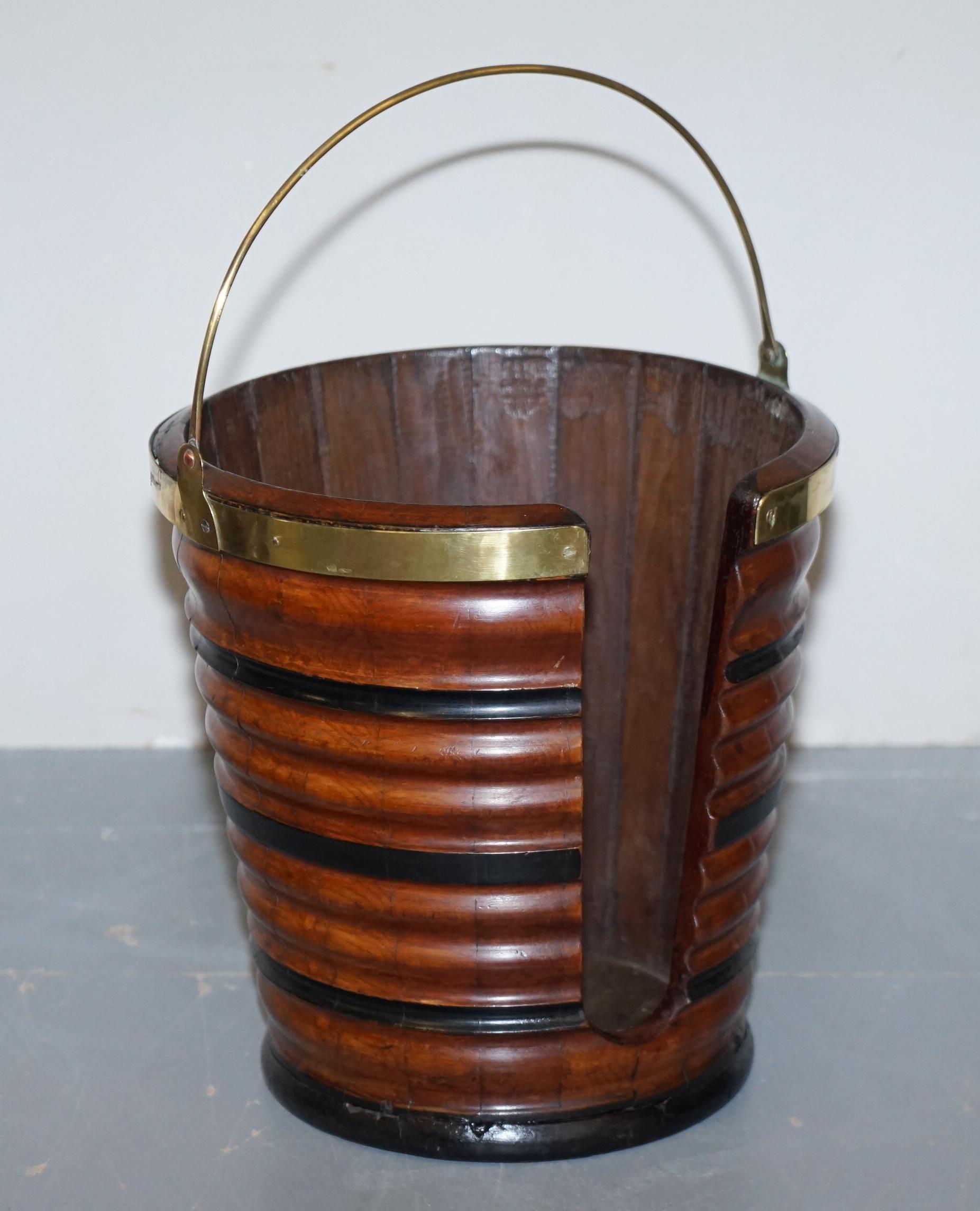 We are delighted to offer for sale this exquisite pair of original George III plate buckets circa 1780 hand carved in mahogany with brass trim

Highly collectable, handmade, these are just about as fine and original as you would hope to come