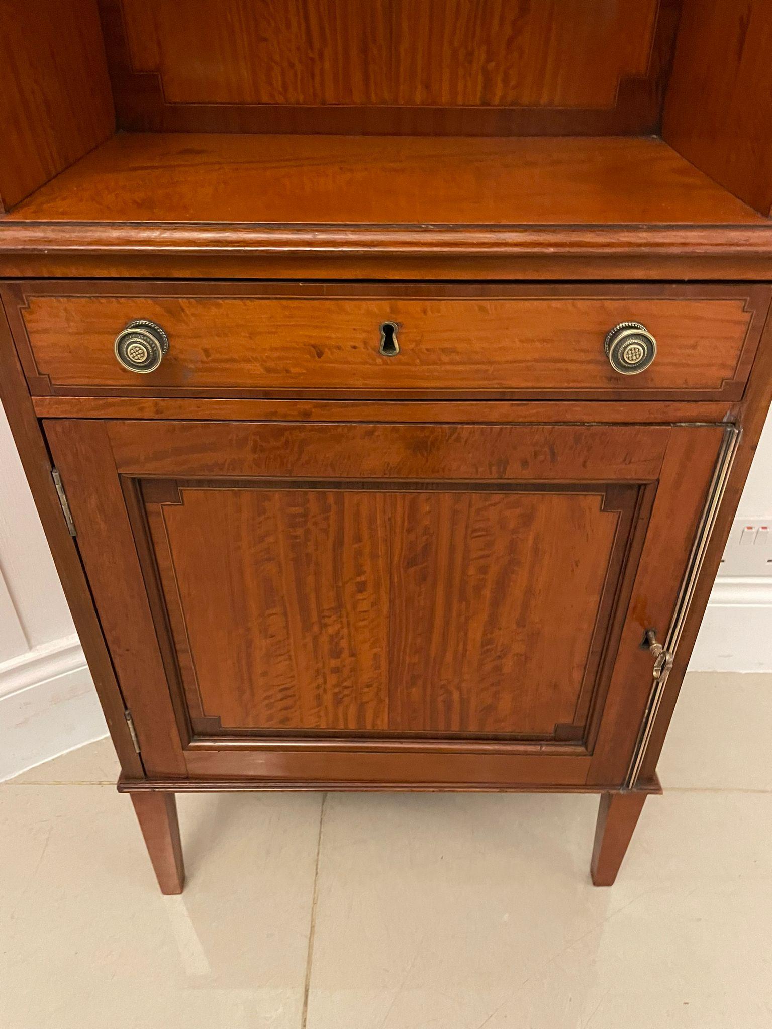 Rare pair of Gillows antique quality satinwood waterfall bookcases having the original brass gallery above a satinwood open waterfall bookcase with crossbanded satinwood backs and tops, one drawer,  original brass knobs stamped Gillows above a