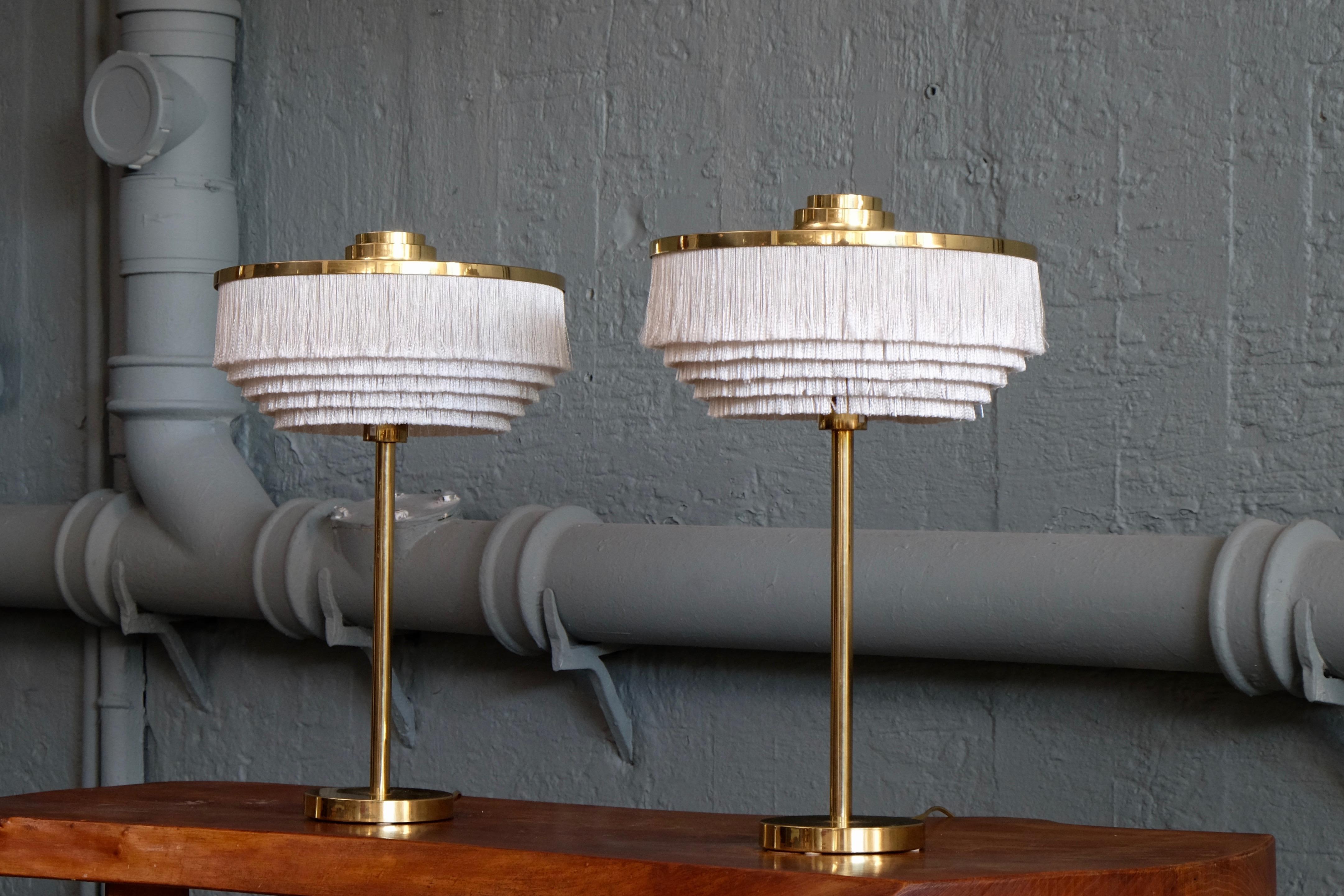Rare pair of white table lamps produced by Hans-Agne Jakobsson in Markaryd, Sweden.
New wiring. Excellent condition.