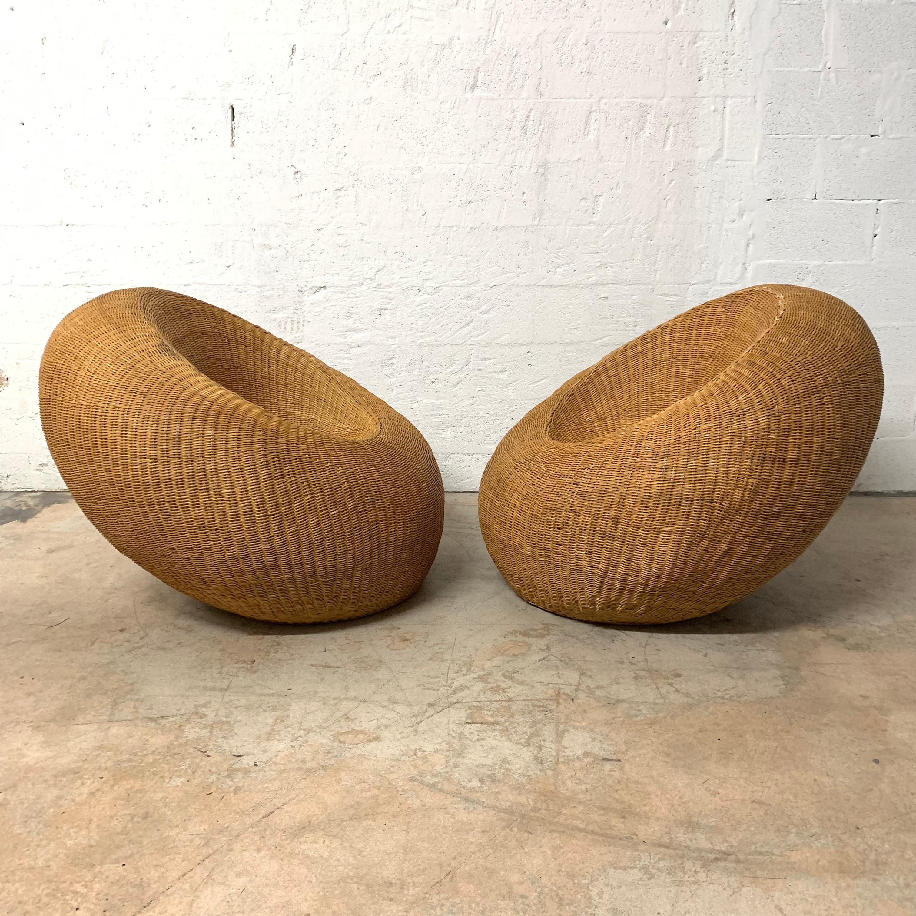 Pair of pod chairs rendered in bent rattan and wicker by Isamu Kenmochi for Yamakawa Rattan of Japan, 1960s.