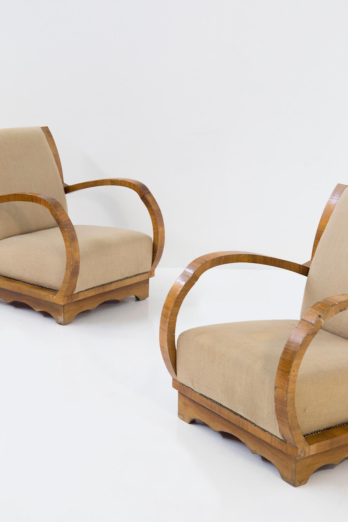 Mid-Century Modern Rare pair of Italian armchairs with elegant scrollwork For Sale