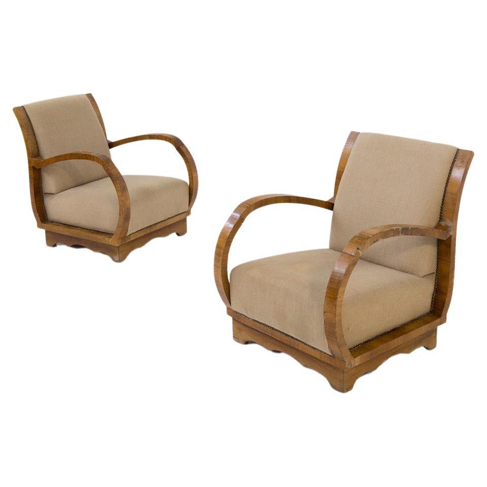 Rare pair of Italian armchairs with elegant scrollwork For Sale