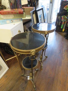 Seltenes Paar Beistelltische aus schwarzem Granit mit Bronzebeschlägen im Jansen-Stil