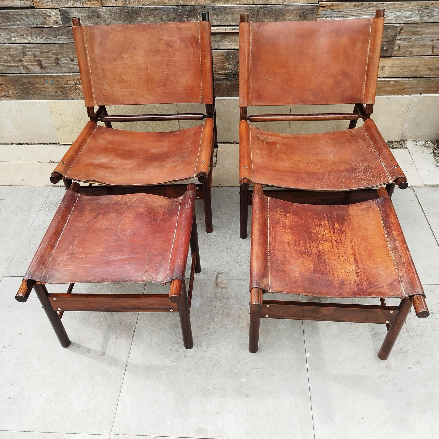 Rare pair of armchairs and ottomans by Jorge Zalszupin, Brazil, 1960's. Zalszupin, a native Polish, first became an architect in Paris, before immigrating to Brazil in 1949 influenced by the works of Oscar Niemeyer.
The armchairs and ottomans are in