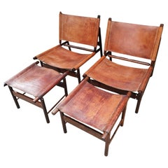 Rare pair of Jockey armchairs and ottomans by Jorge Zalszupin, 1959
