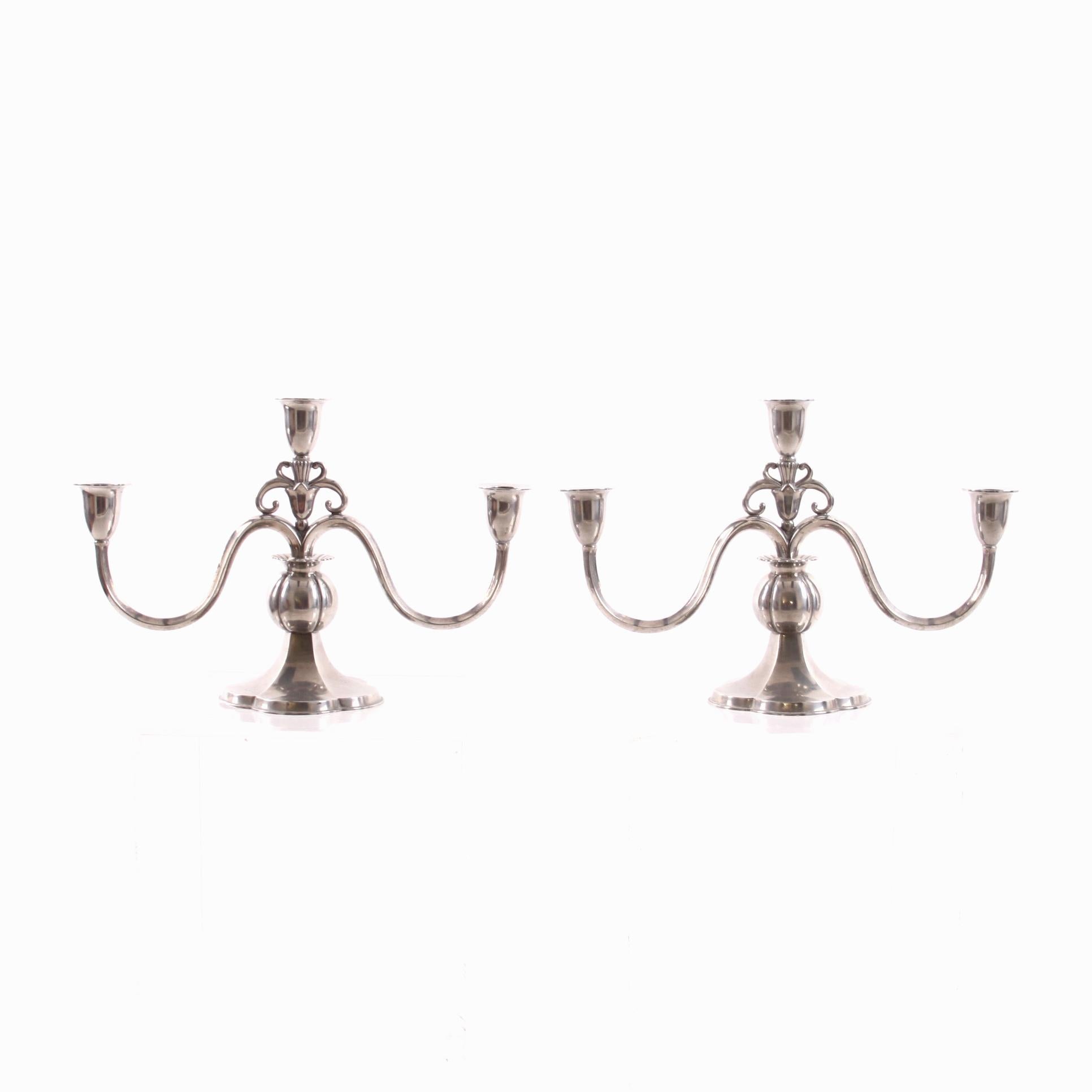 Just Andersen - Scandinavian Modern

A pair of pewter candelabras with three arms, Dessin 1169, manufactured in Denmark 1930s. 

Each candelabra stamped Just 1169 Denmark. 

Excellent vintage condition and a beautiful attribution to any interior.