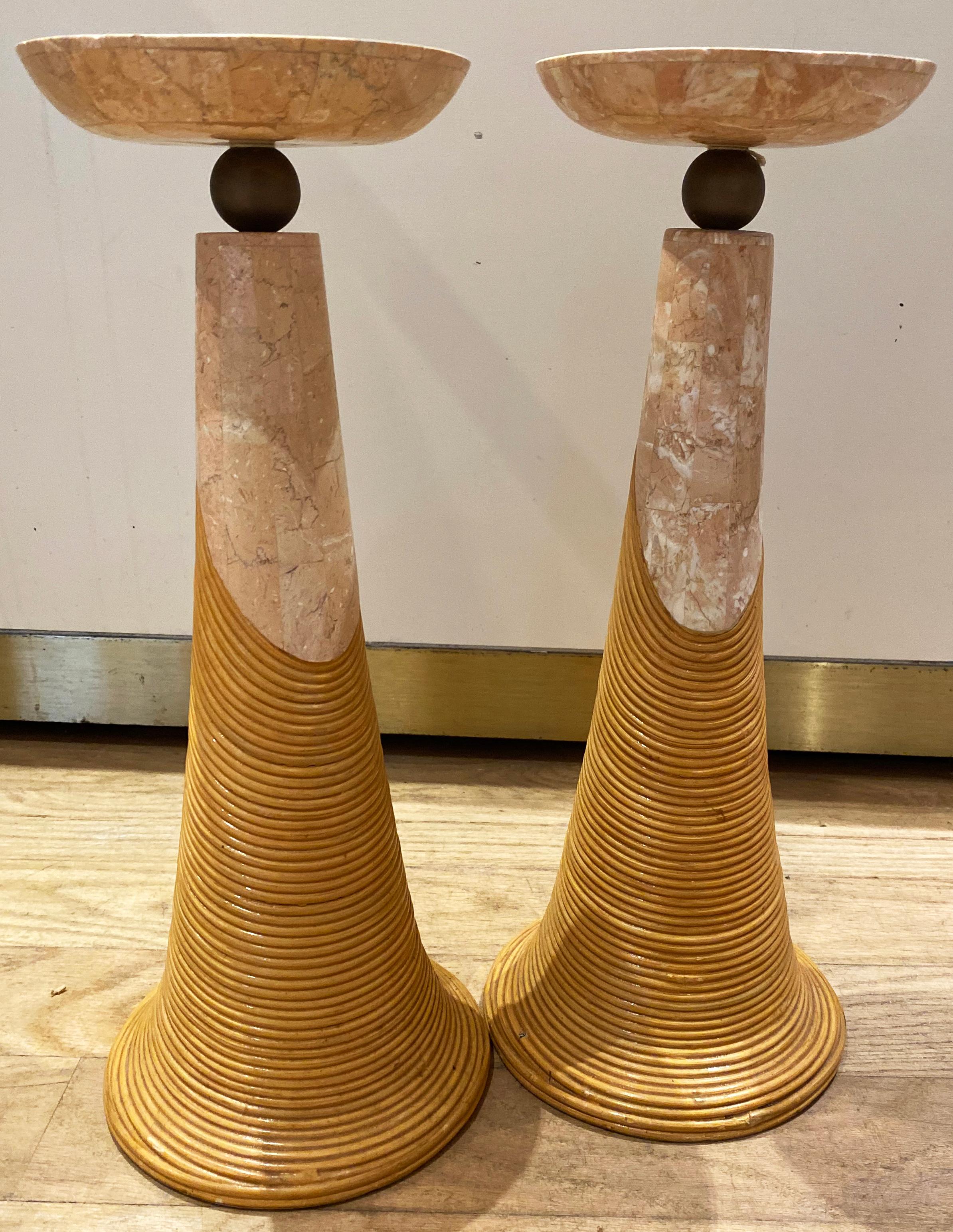 Rare pair of candle holders in tessellated stalactite travertine, pencil reed rattan, and brass. This set is meticulously made in beautiful materials for Karl Springer circa 1980's.